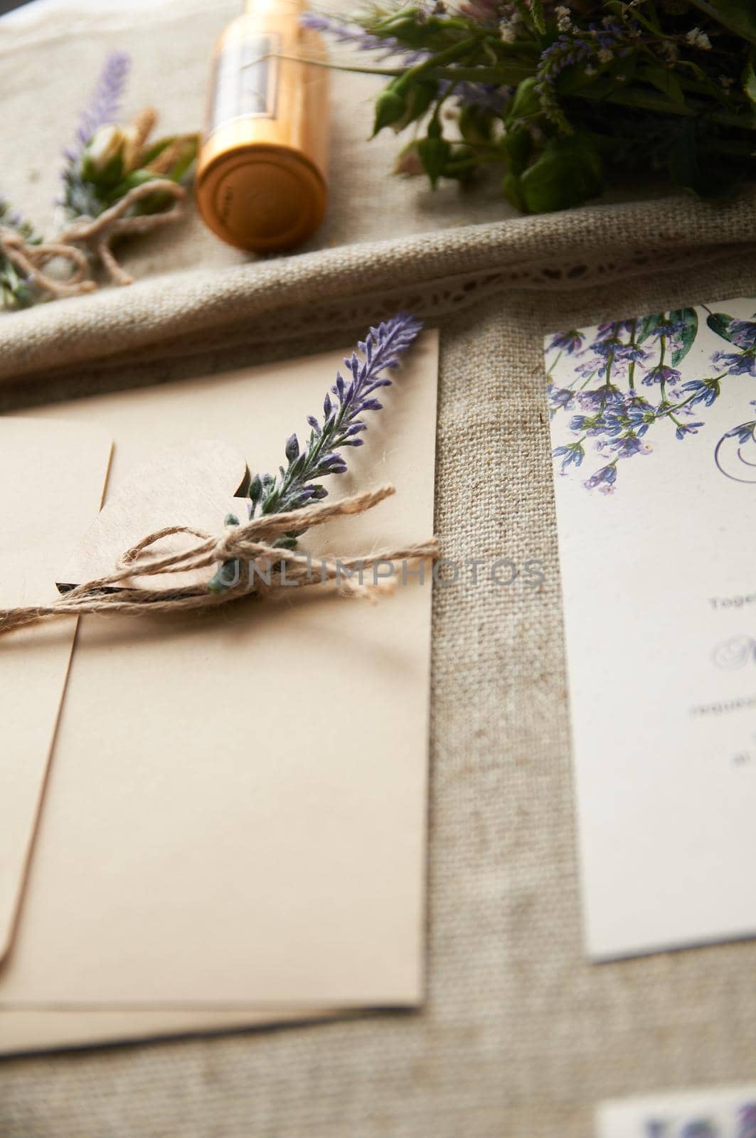 boho style wedding bouquet on table with linen tablecloth