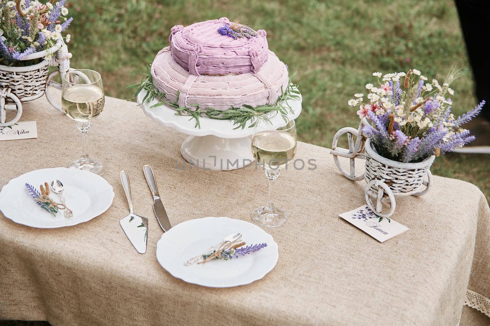 boho style wedding table with cake for bride and groom