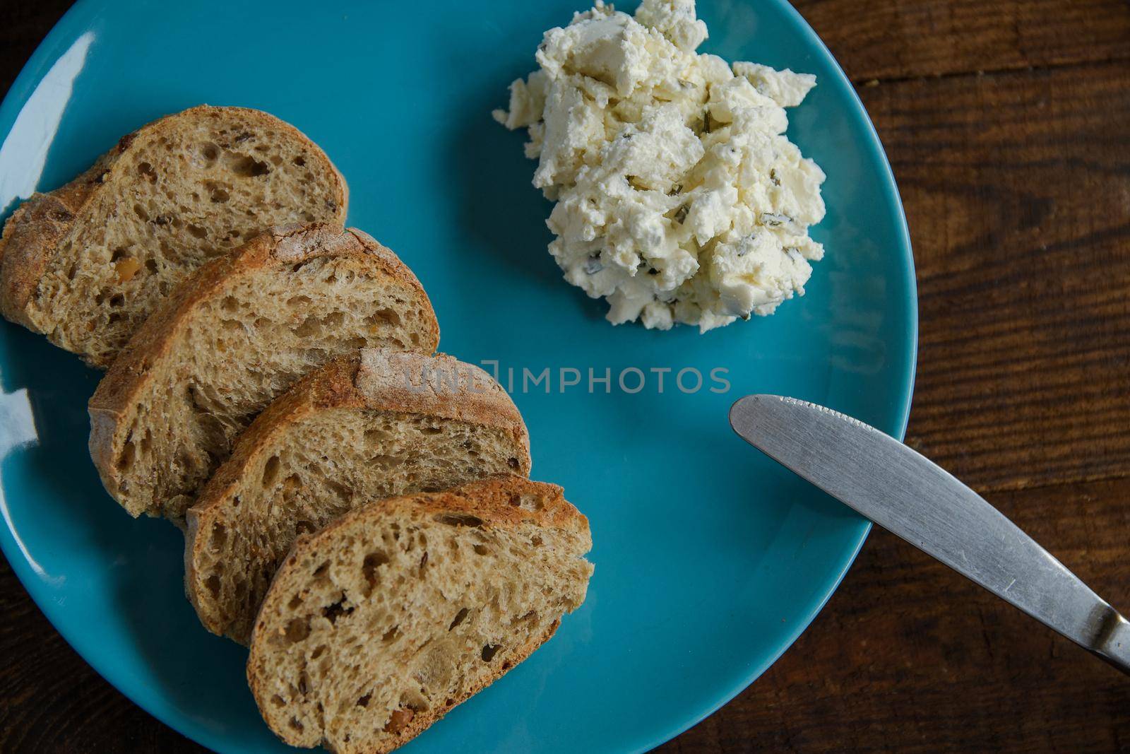 Breakfast bread toast on a blue plate by ozornina