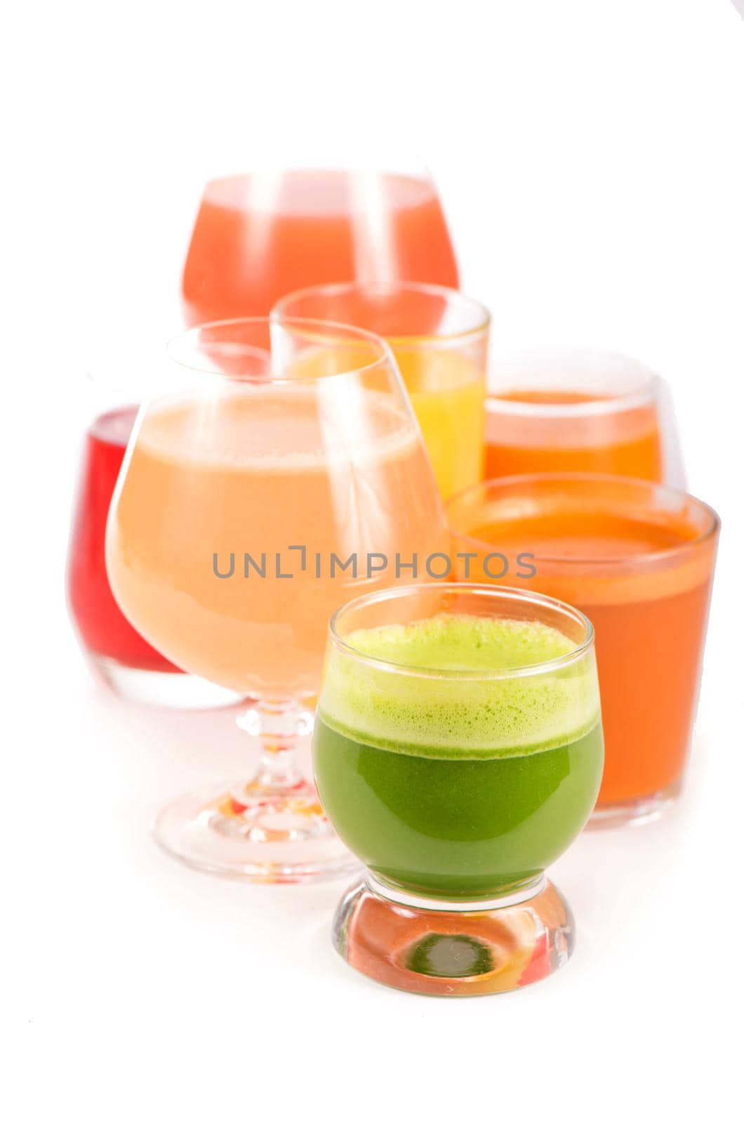 Glasses with fresh organic vegetable and fruit juices isolated on white. Detox diet