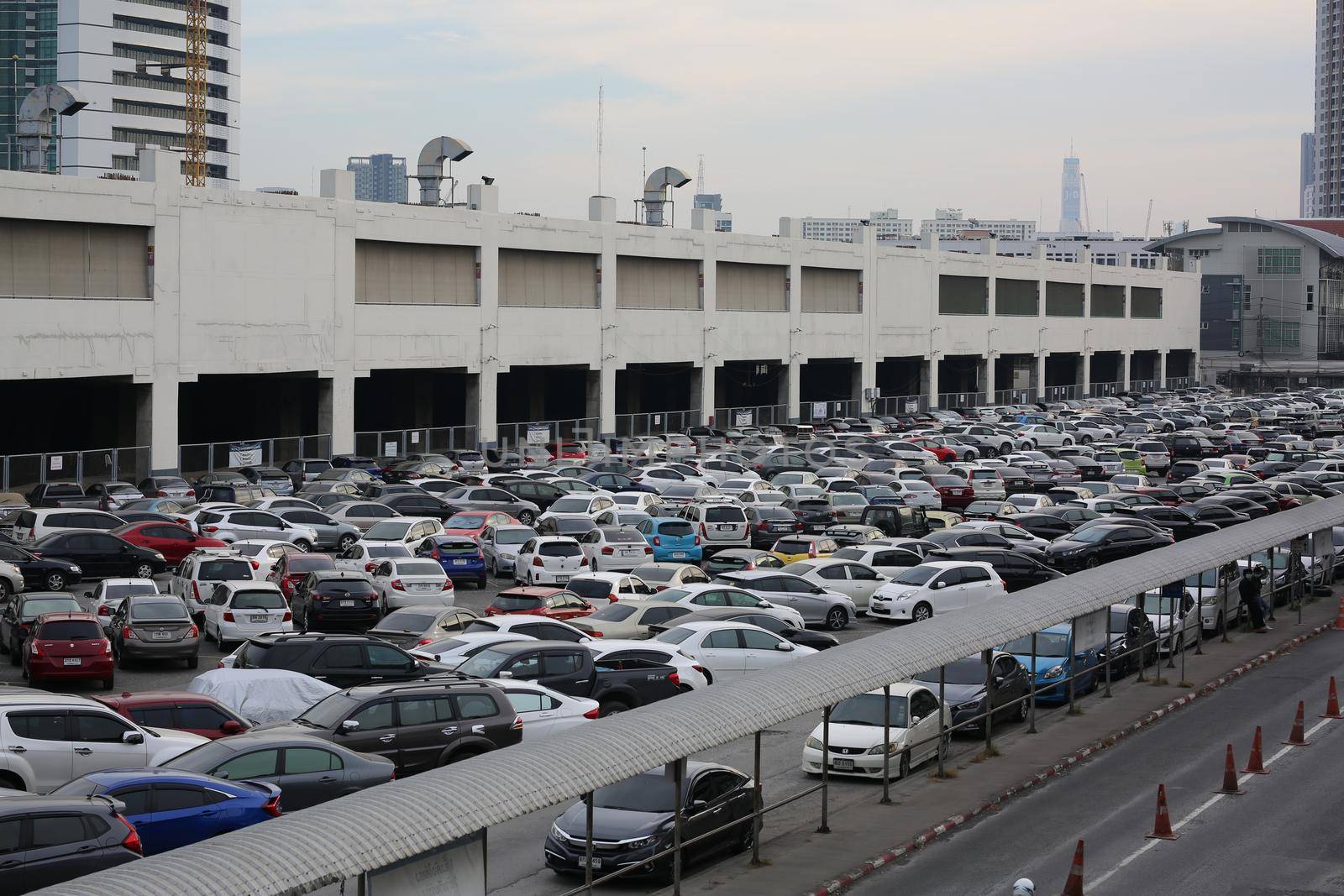 cars parking on train station by chuanchai