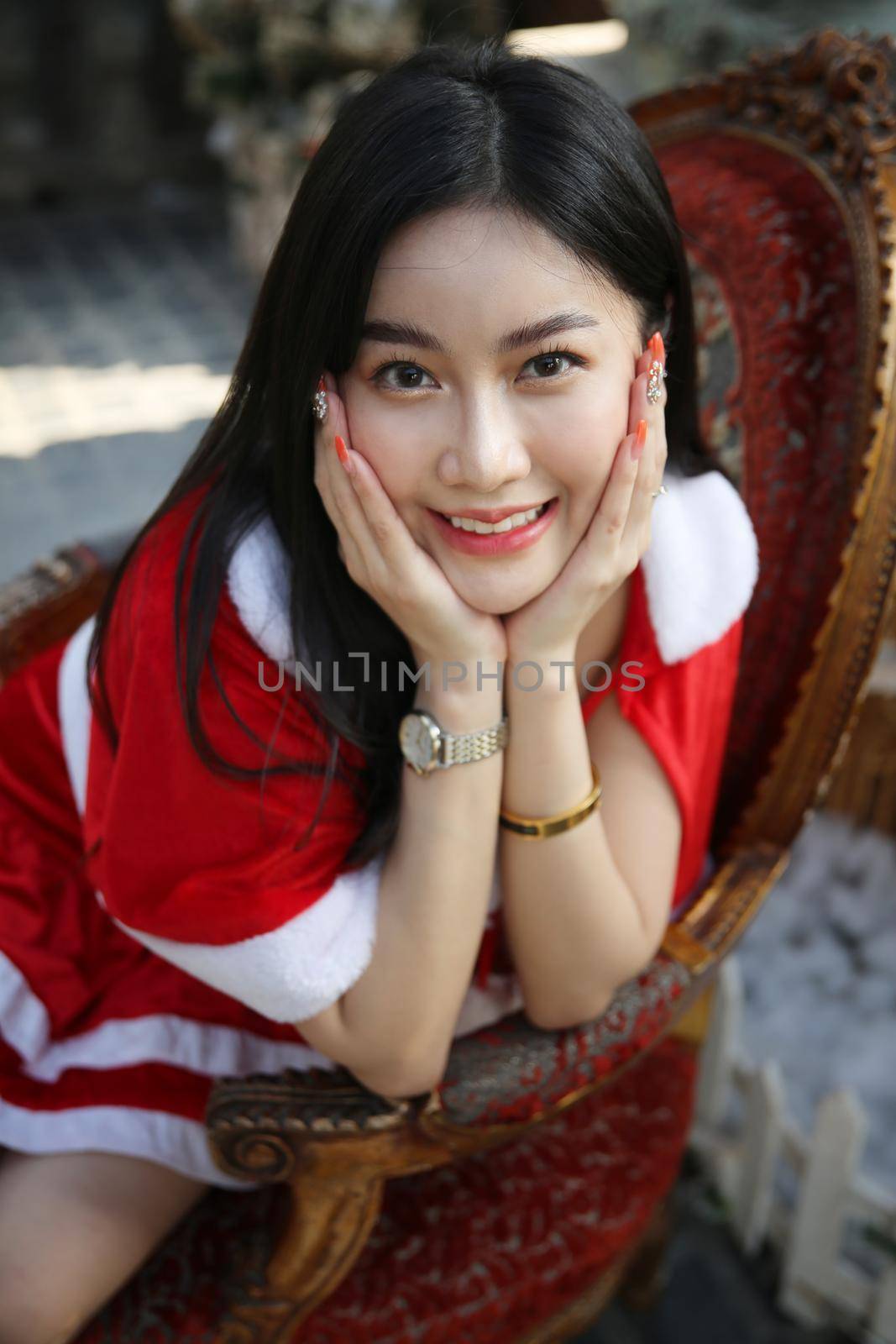 Young woman in red santa costume, Girl celebrates New Year 2021 in winter. Shopping black friday sale concept