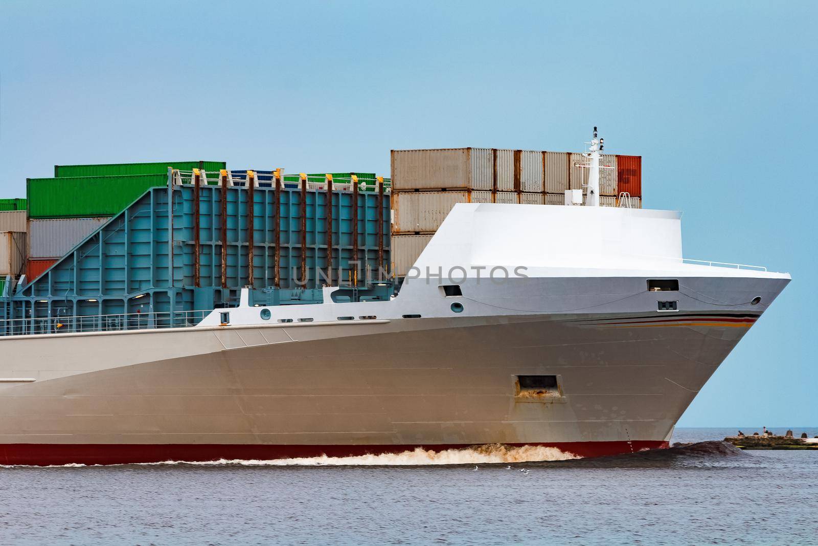 Grey container ship. Logistics and production import