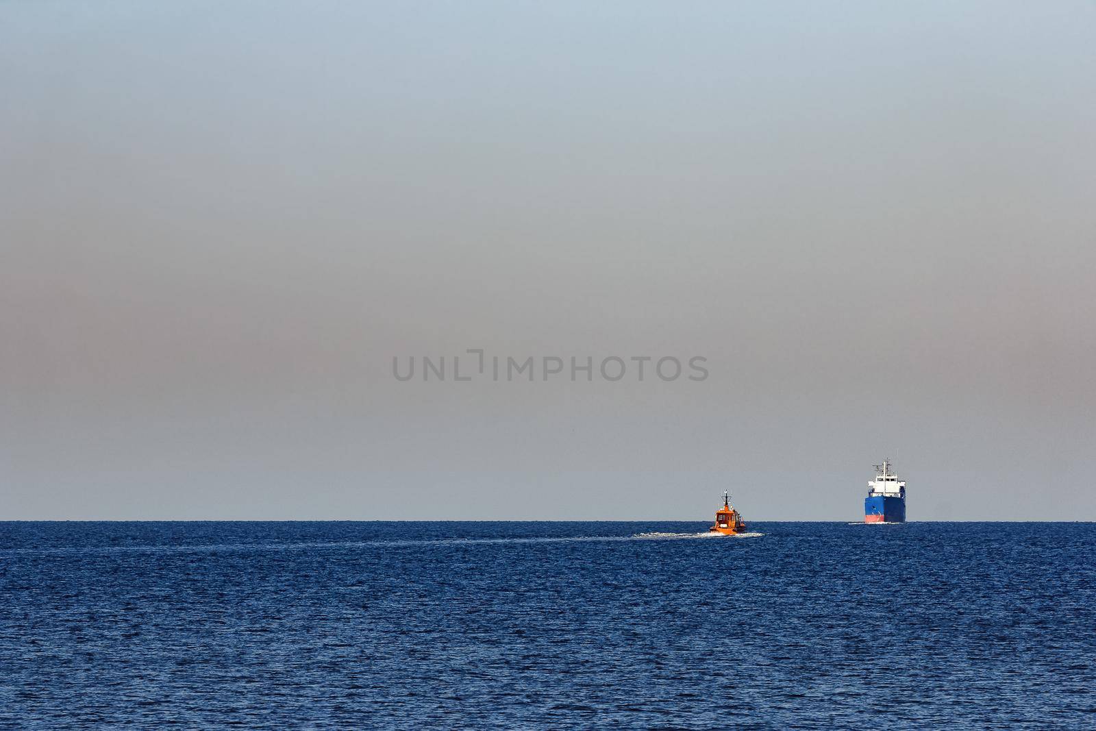 Blue cargo ship sailing from the Baltic sea