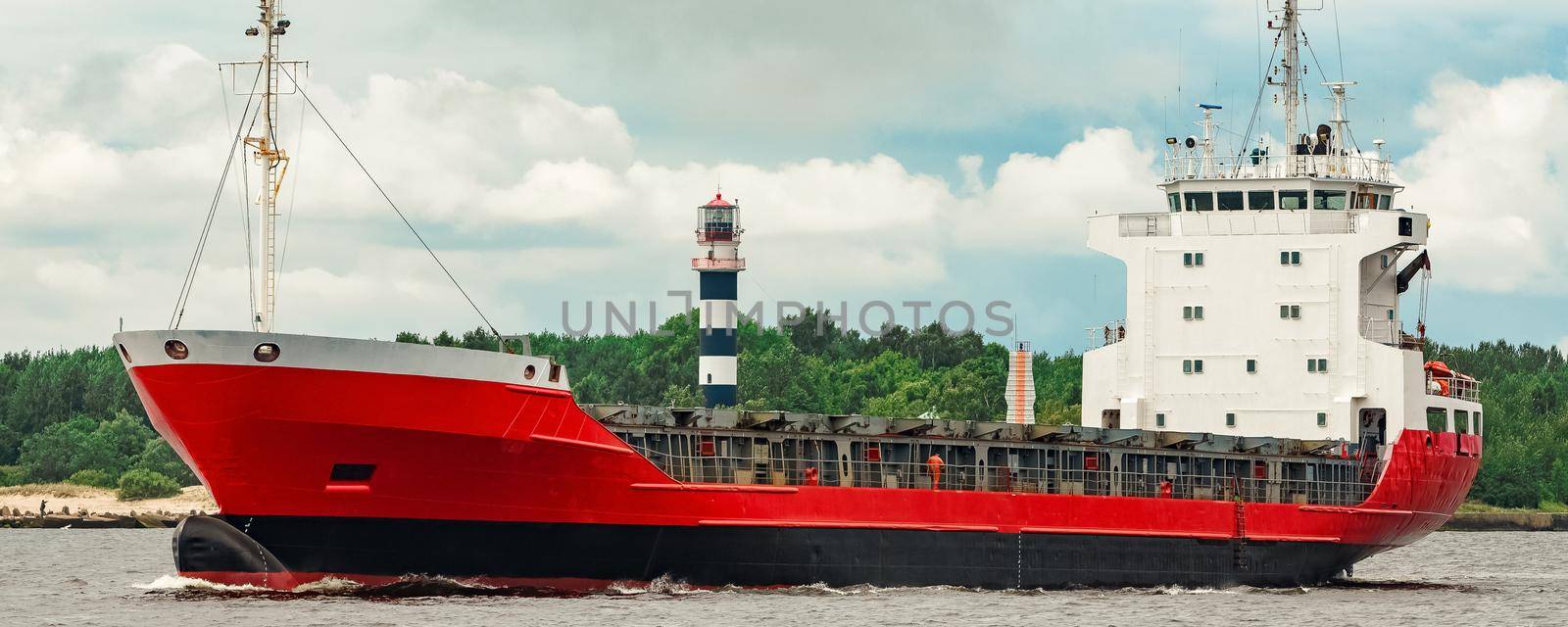 Red new cargo ship moving abroad. Product export in Europe
