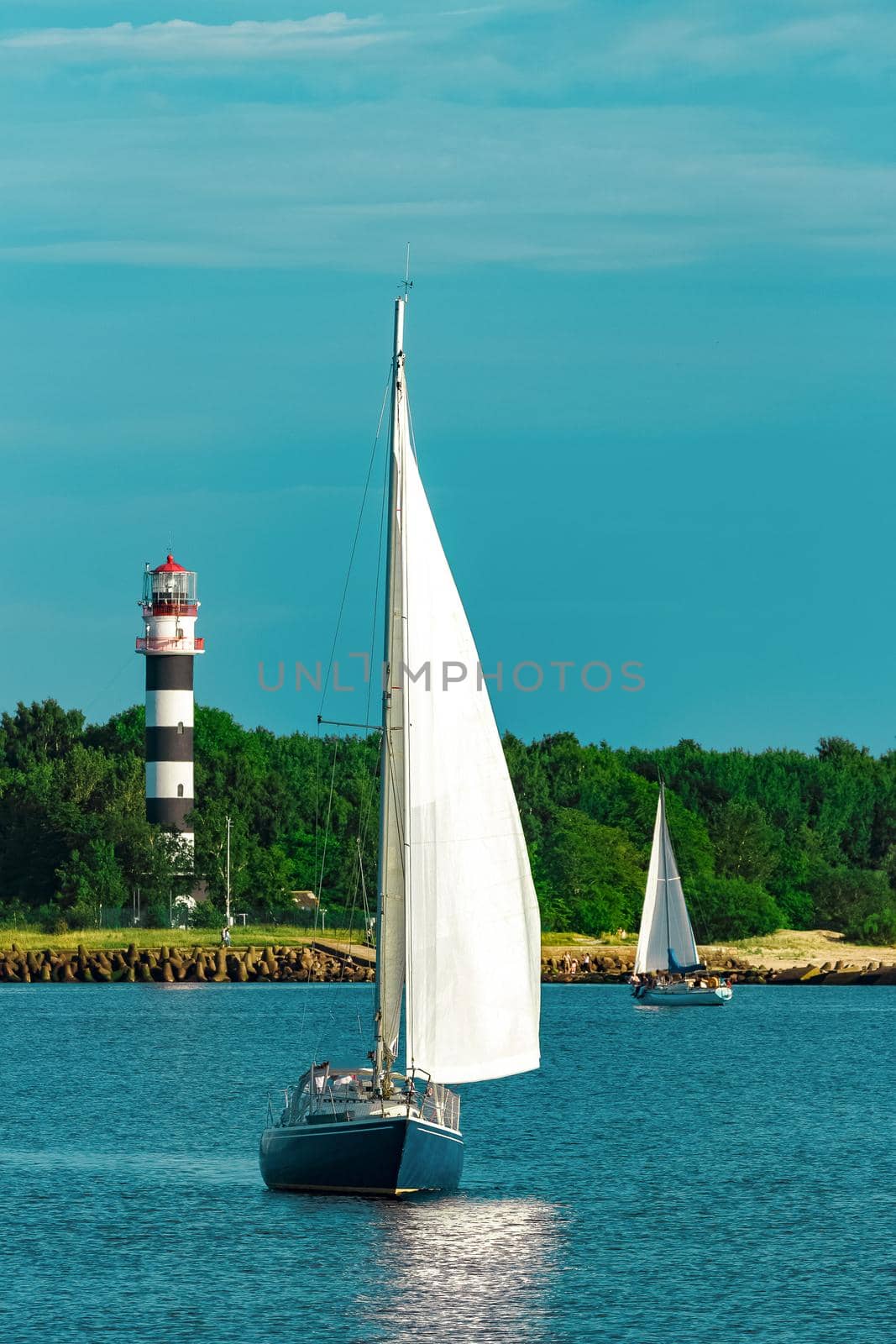 Blue sailboat at river by InfinitumProdux