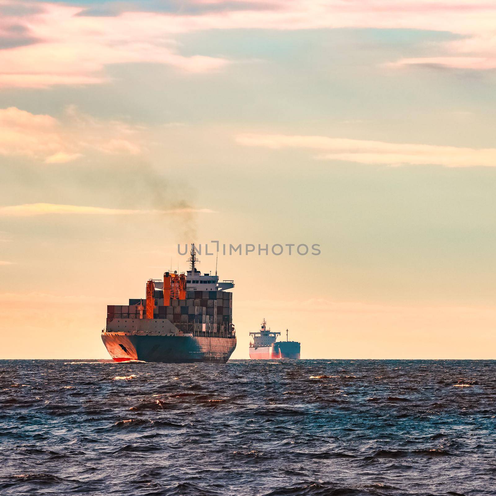 Blue container ship. World logistics and production transfer