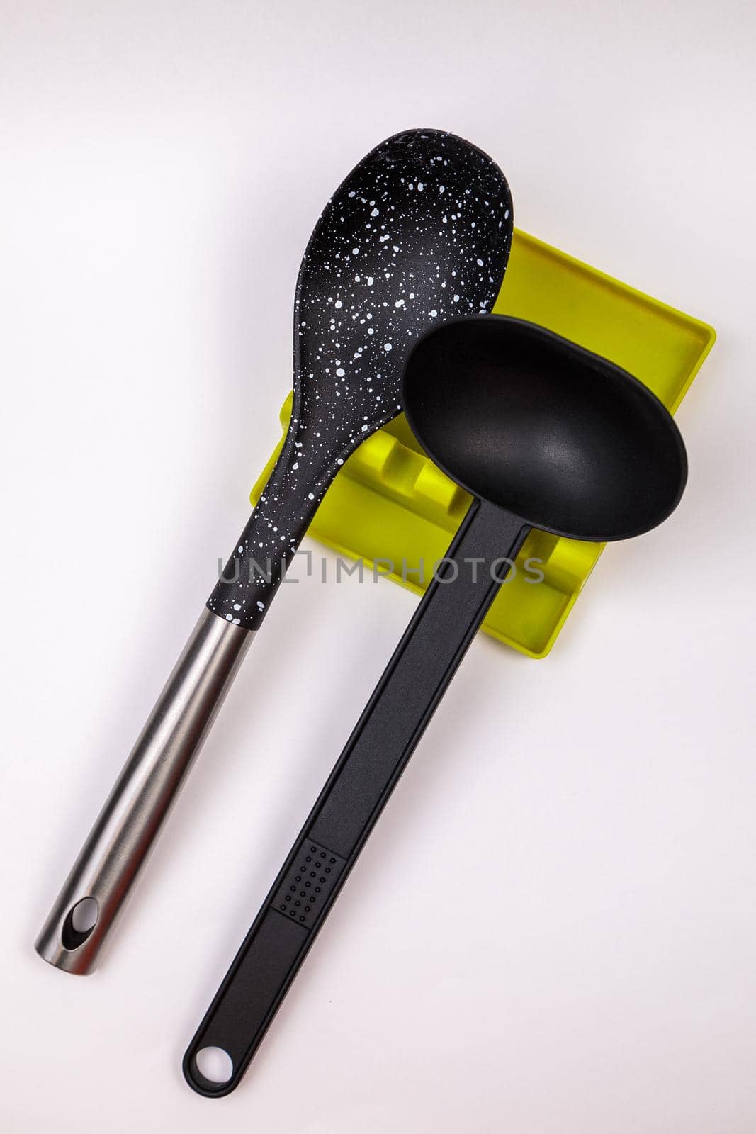 Stand, tray for large spoons, ladles, stirrers. Modern fittings in the kitchen. Convenient to prepare food.