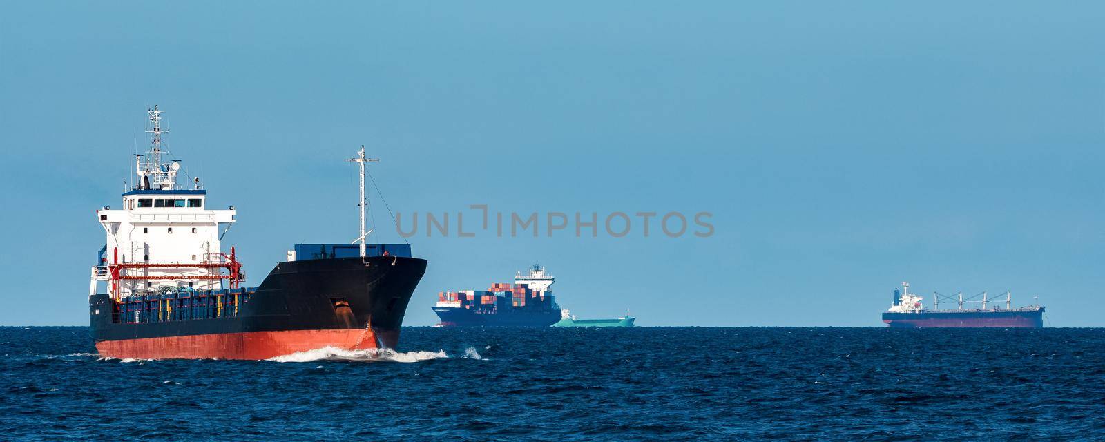 Black cargo ship by InfinitumProdux