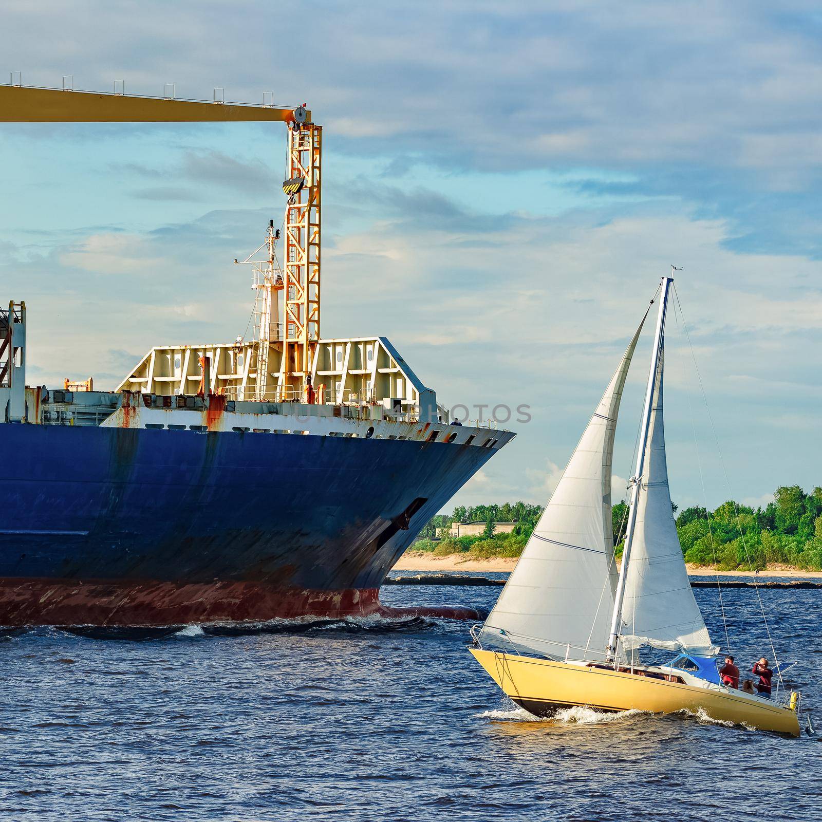 Blue container ship. World logistics and production transfer