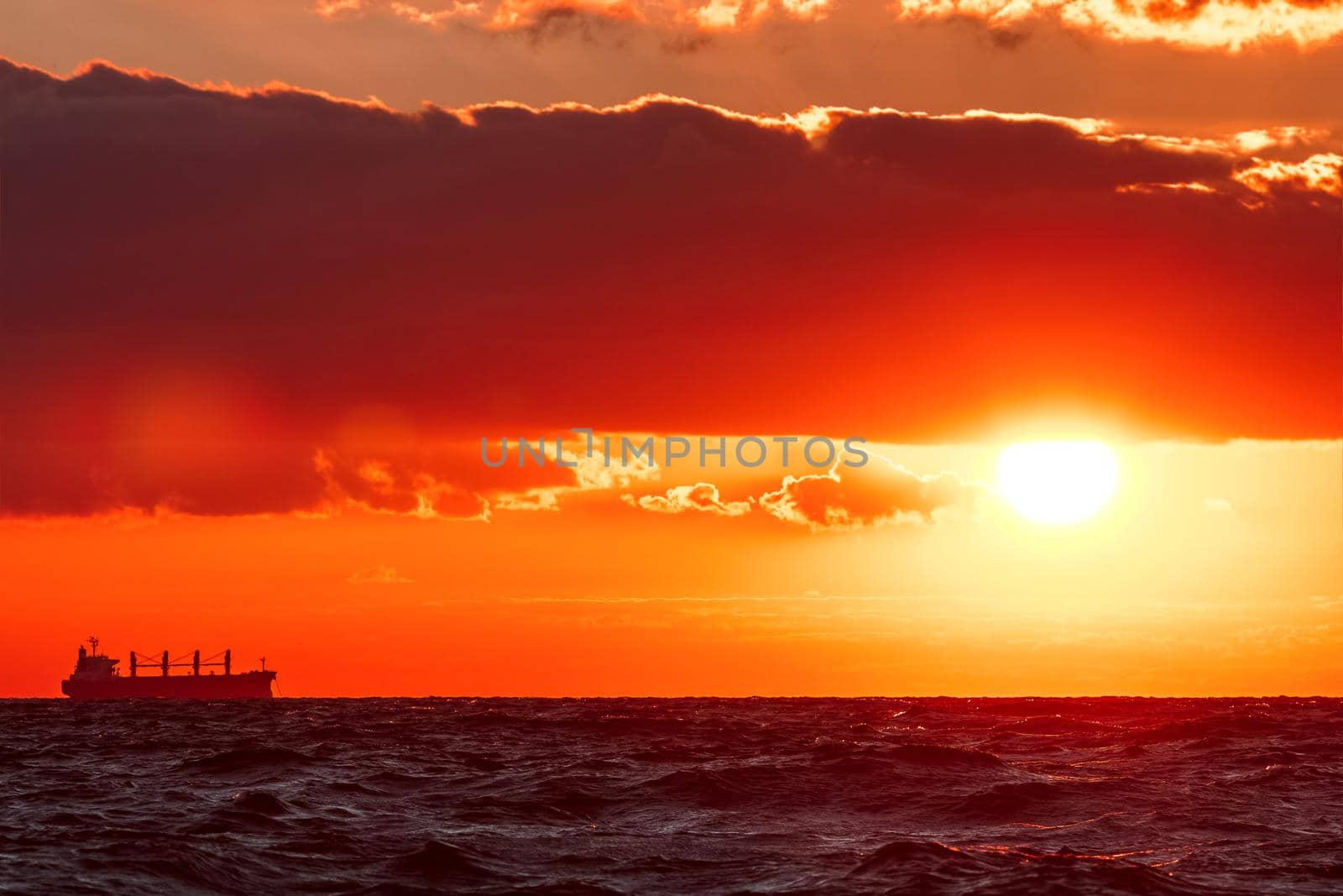 Hot and romantic sunset over the Baltic sea. Calm landscape