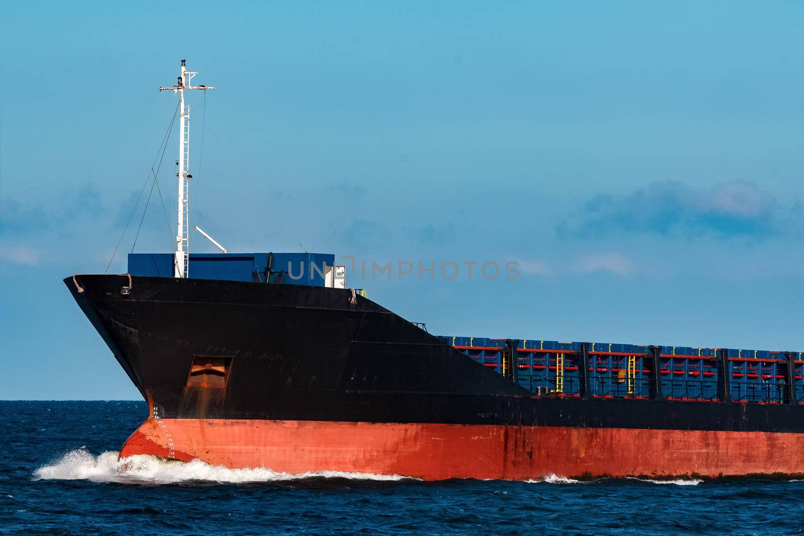 Black bulker ship. Logistics and merchandise transportations