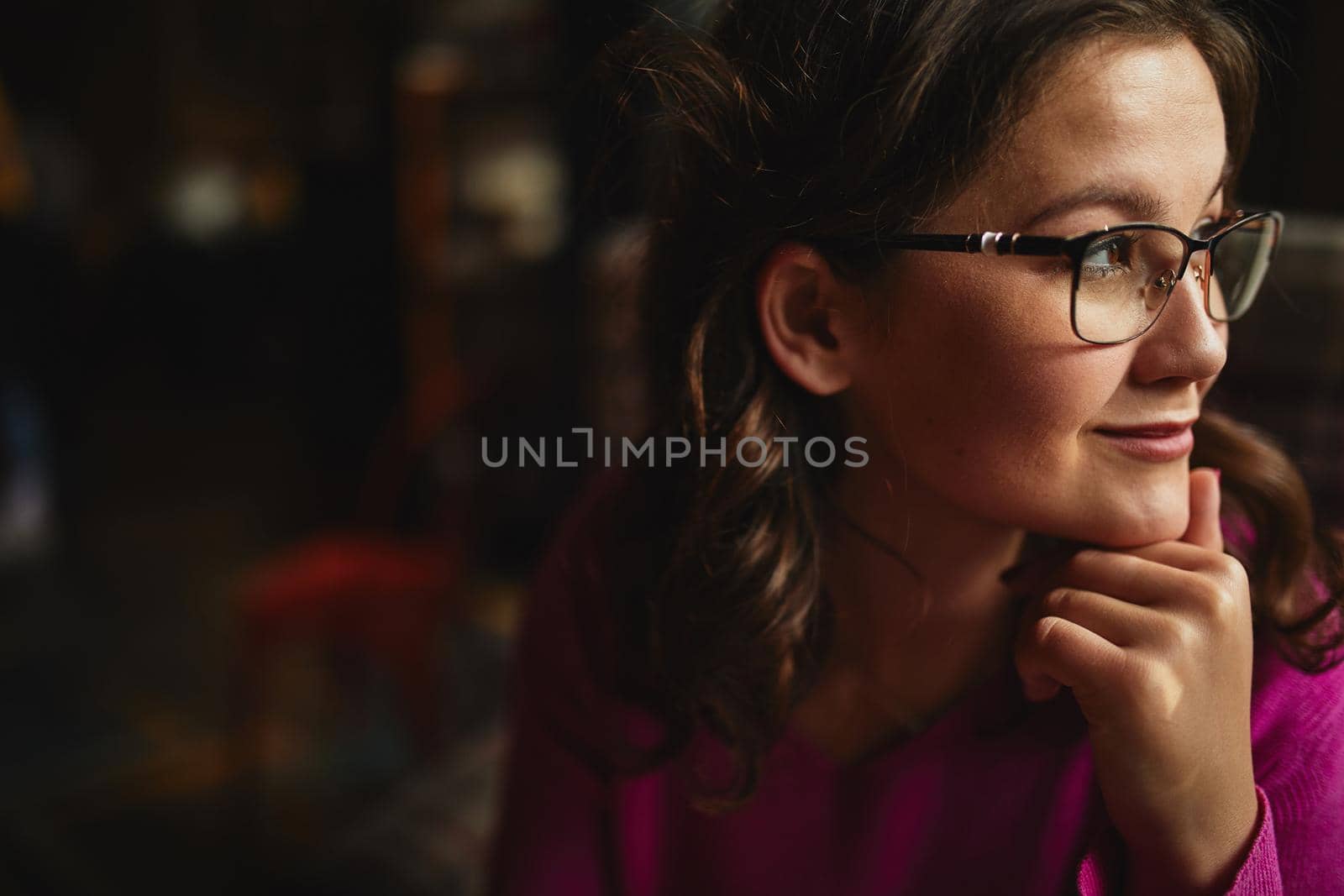 Pretty young female wearing glasses and smiling by monakoartstudio