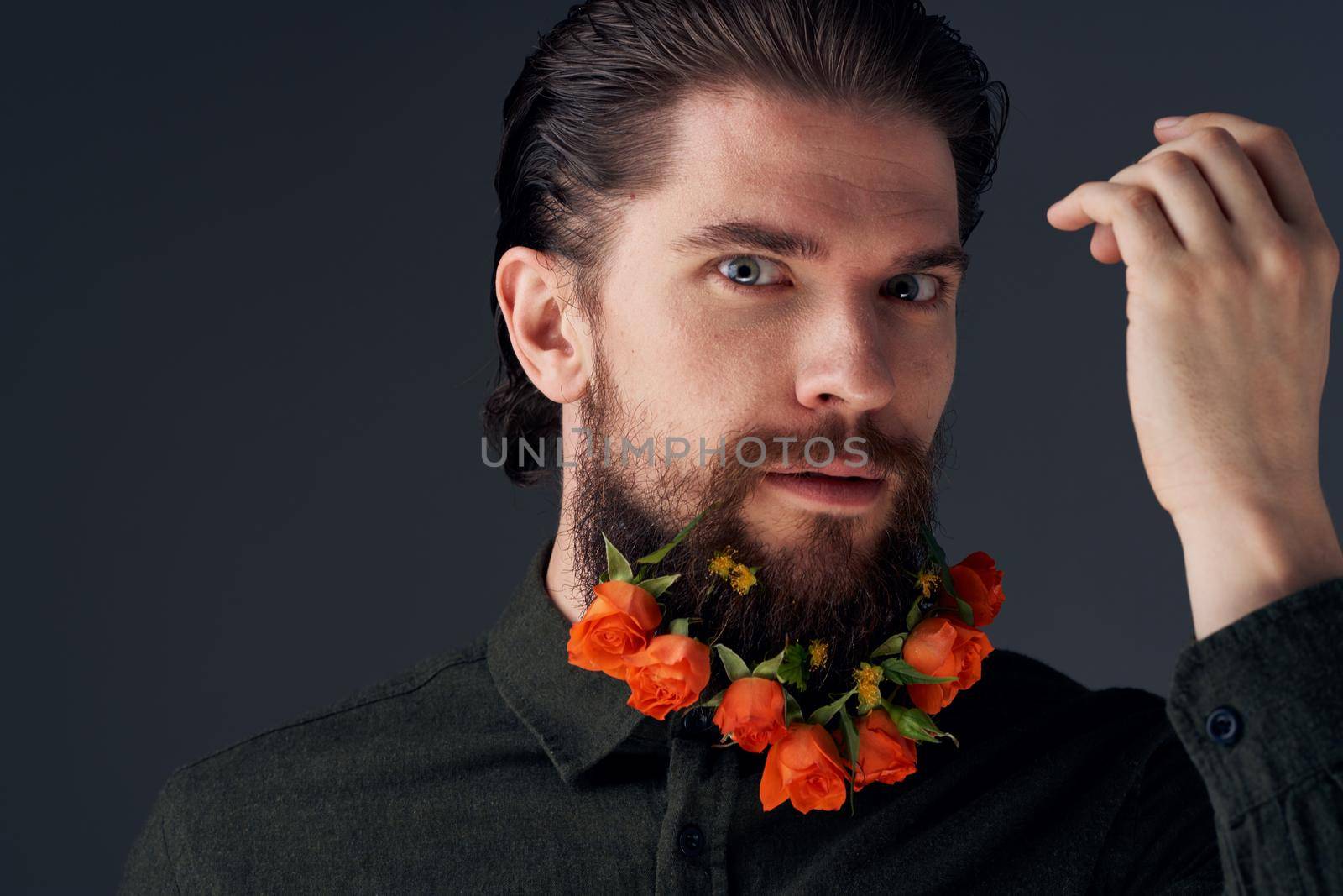Bearded men flowers decoration gift romance black background. High quality photo