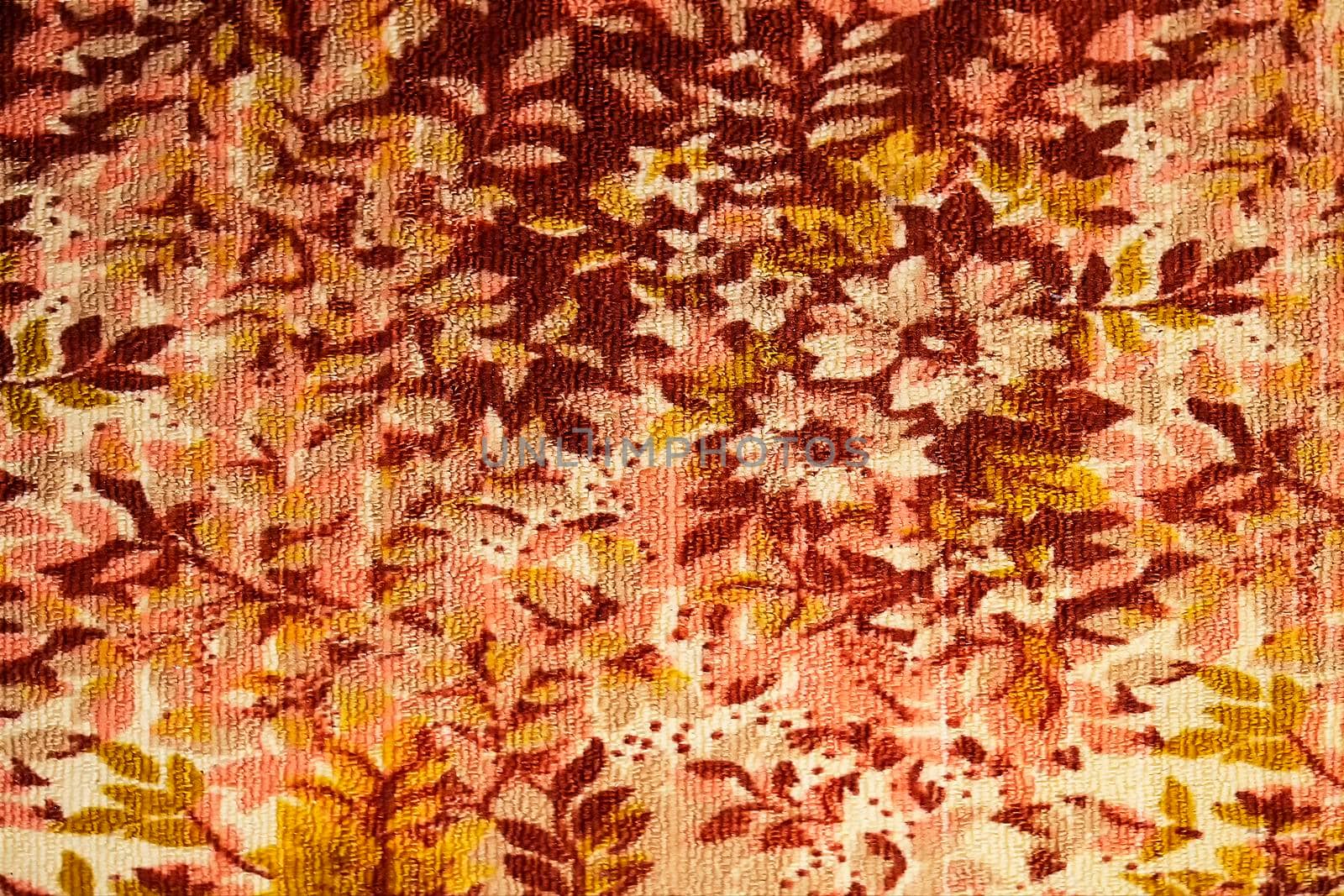 View from the front. Brown with yellow.