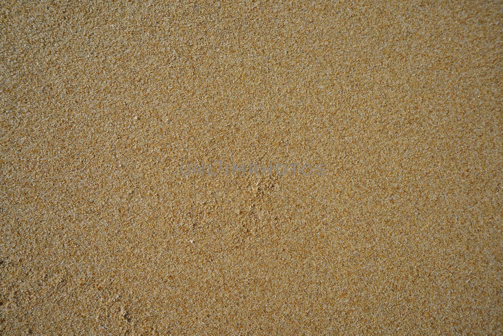 Natural background of yellow quartz sand. design, art, nature