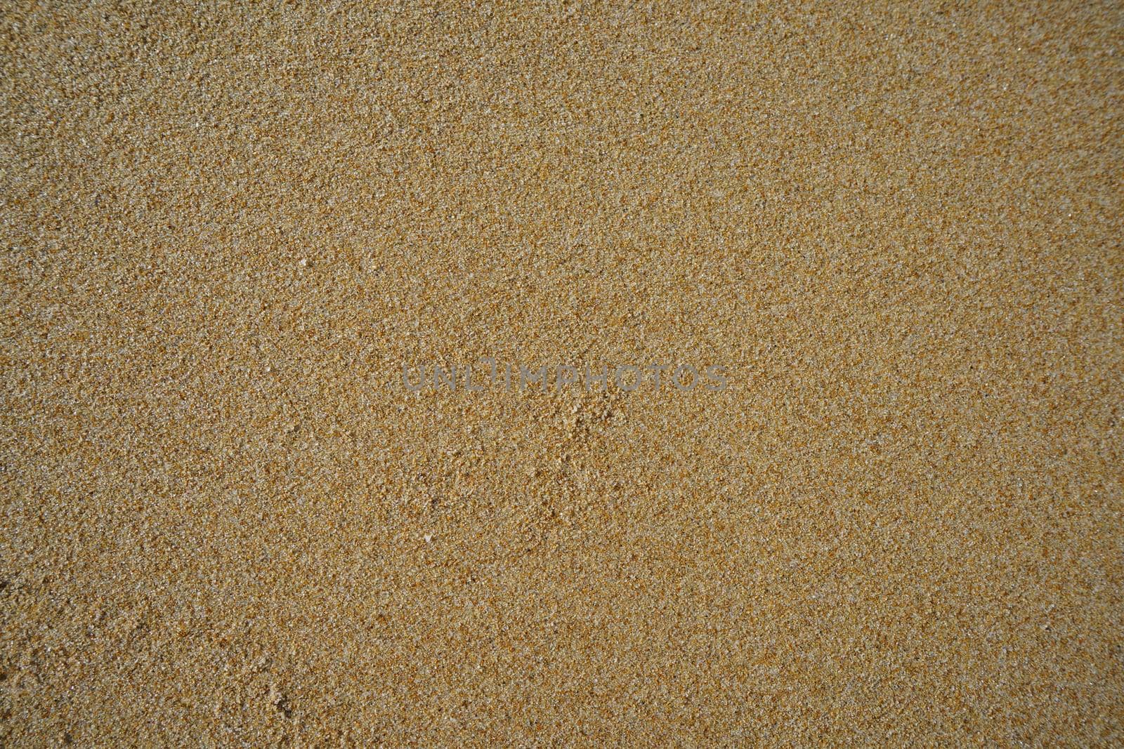 Natural background of yellow quartz sand. design, art, nature