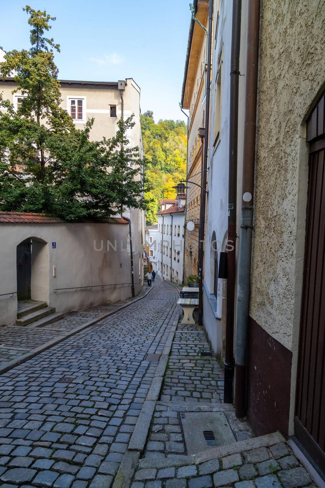 Narrow lane, alley with cobblestone pavement in the historical old city of Passau, Bavaria, Germany