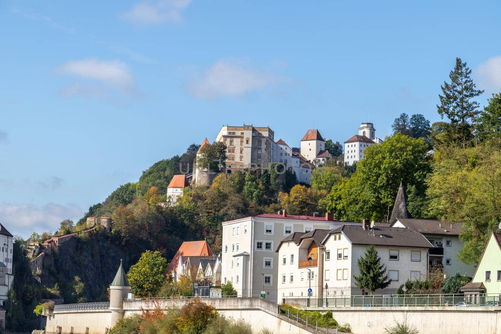 View at Fortress Veste Oberhaus and buildings on Danube shore in Passau, Bavaria, Germany in autumn by reinerc