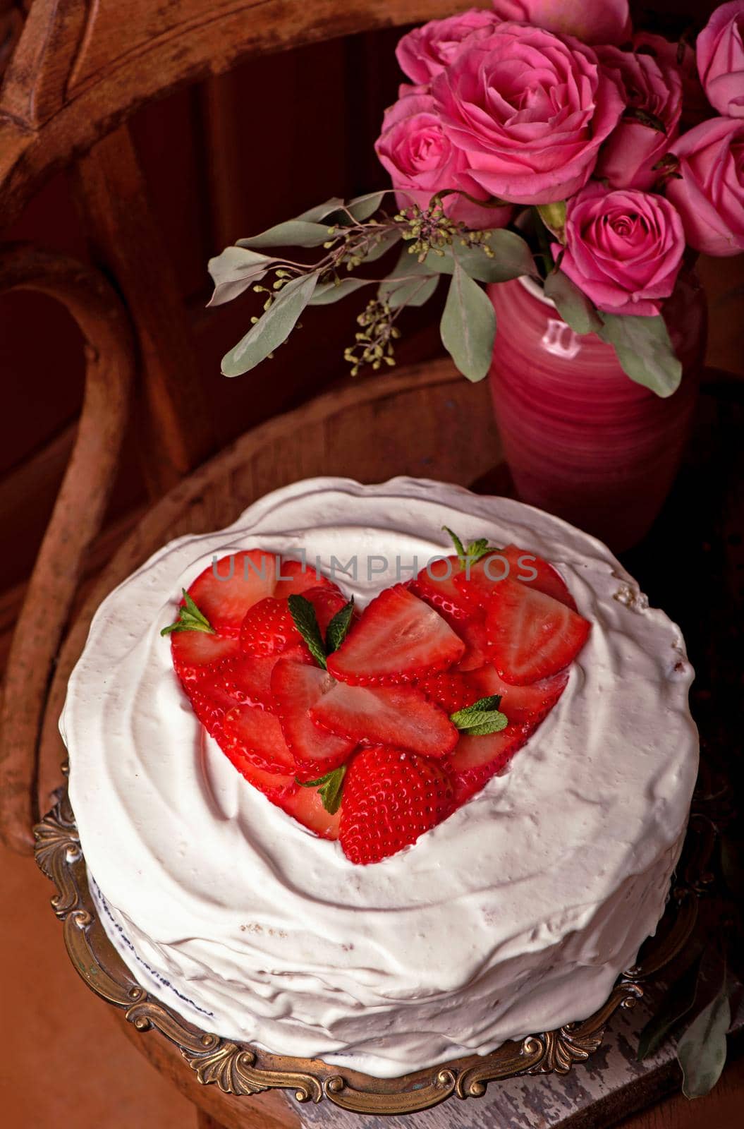 Homemade cream layer cake, fresh, colorful, and delicious dessert with juicy strawberries, sweet whipped cream and cream cheese