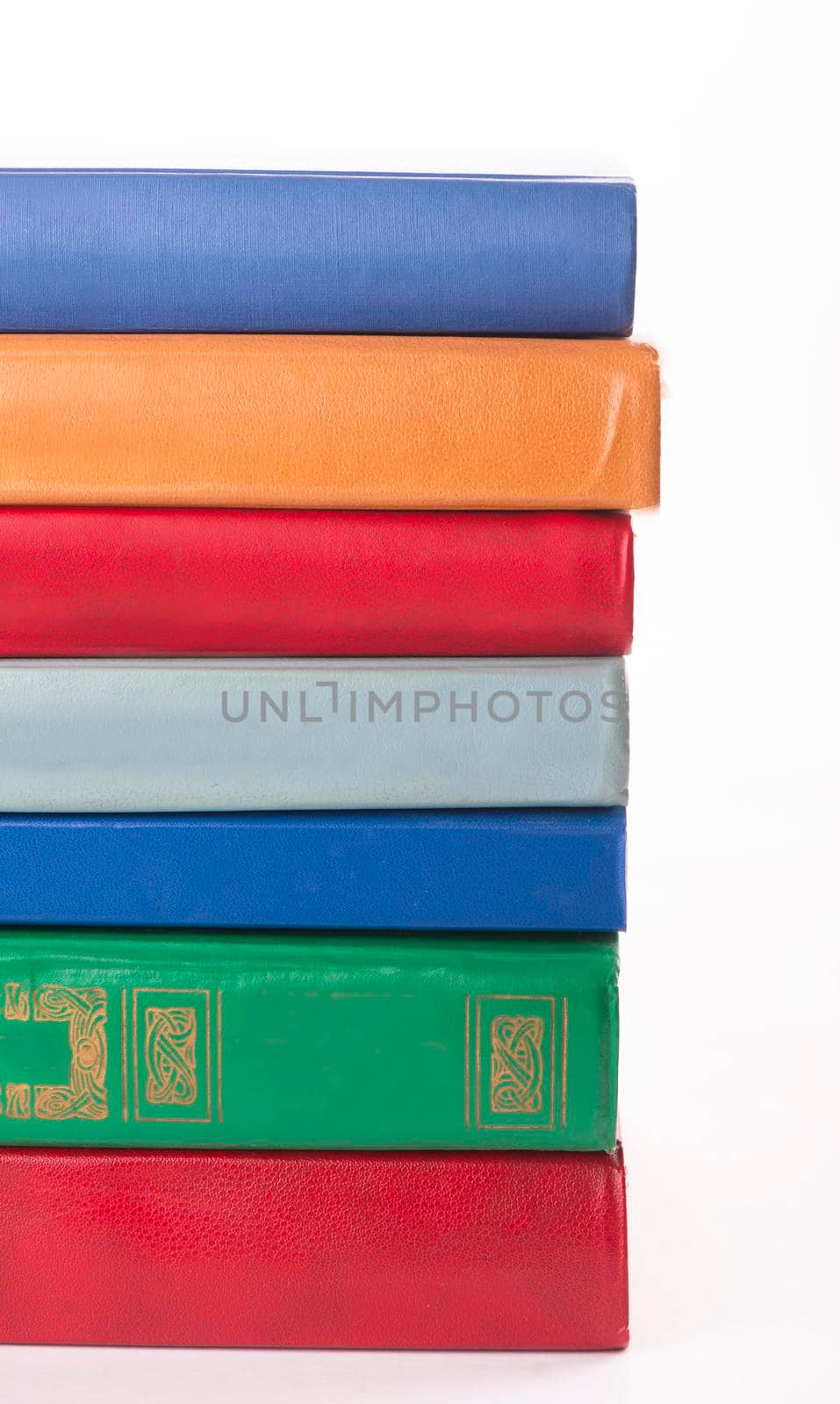 stack of Old books isolated on white.