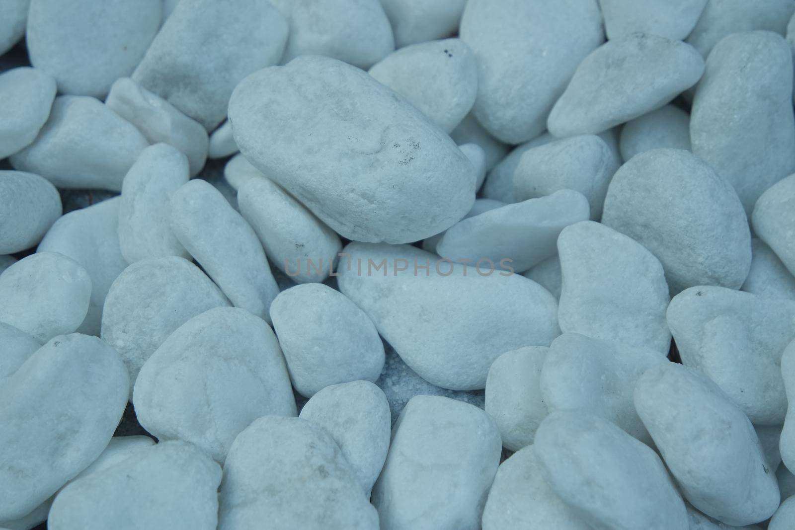 Top view of white stones background.