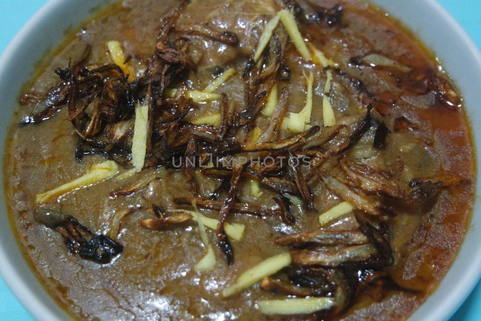 Haleem dish with salad and Lemon juice by Photochowk