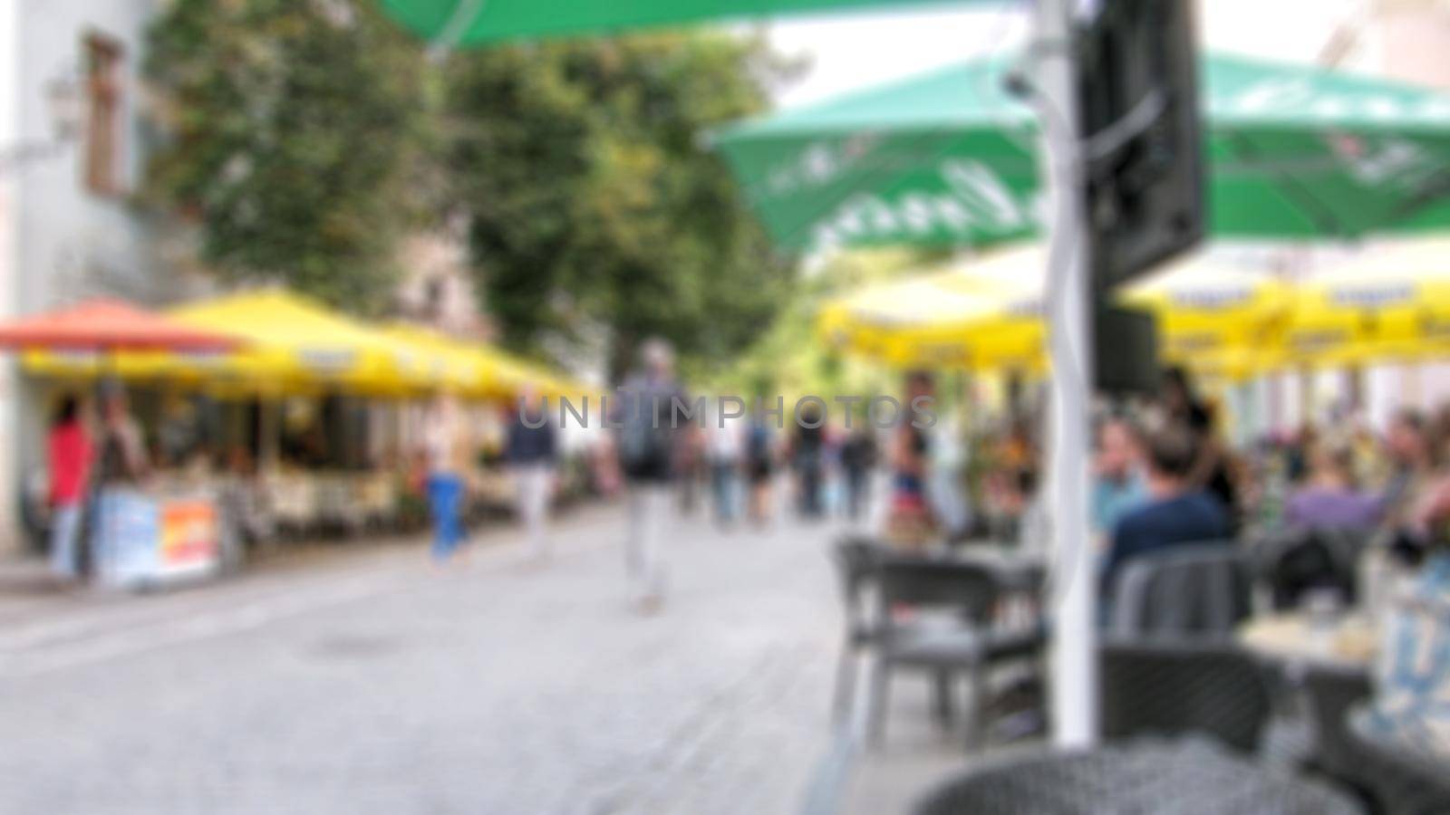 Urban streetscape. Theme of street photography, tourism and travel creative abstract background with blur and bokeh effect