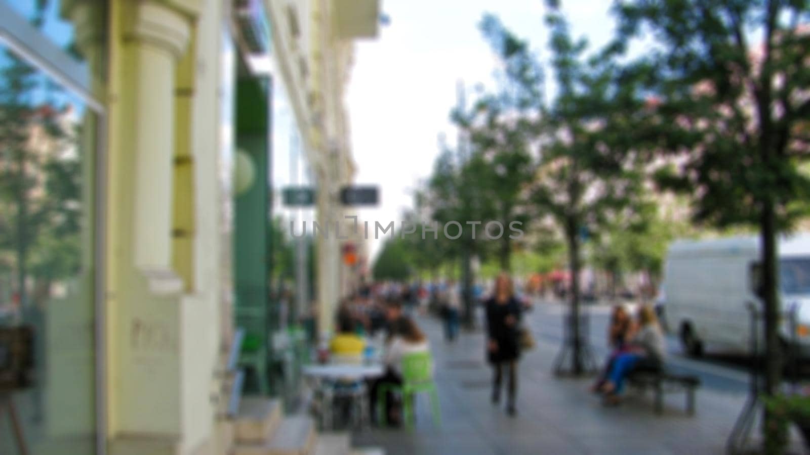 Urban streetscape. Theme of street photography, tourism and travel creative abstract background with blur and bokeh effect
