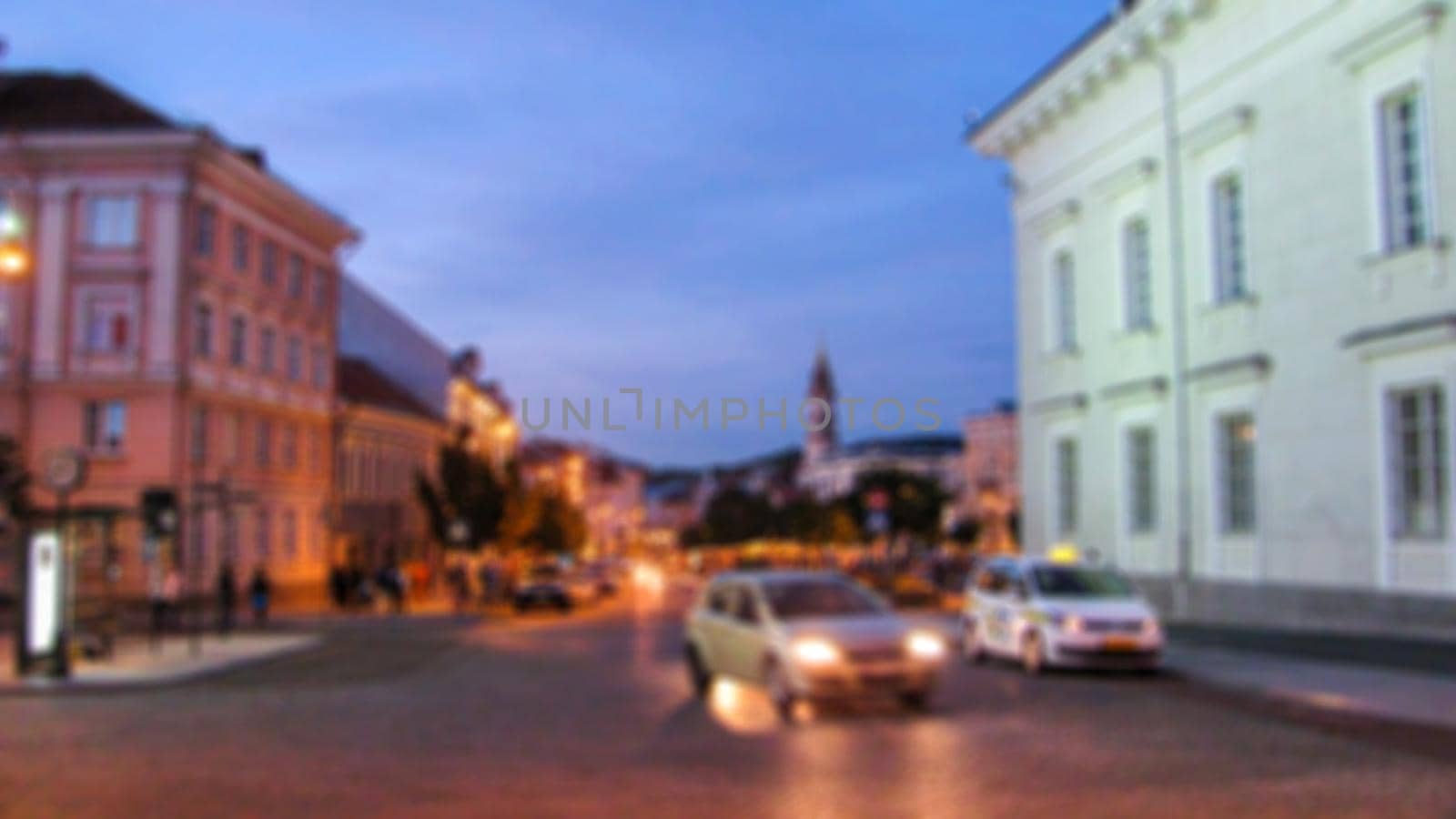 Evening urban street landscape. Street photography, tourism and travel theme creative abstract background with blur and bokeh effect for background, screensaver, Wallpaper, decoration and design
