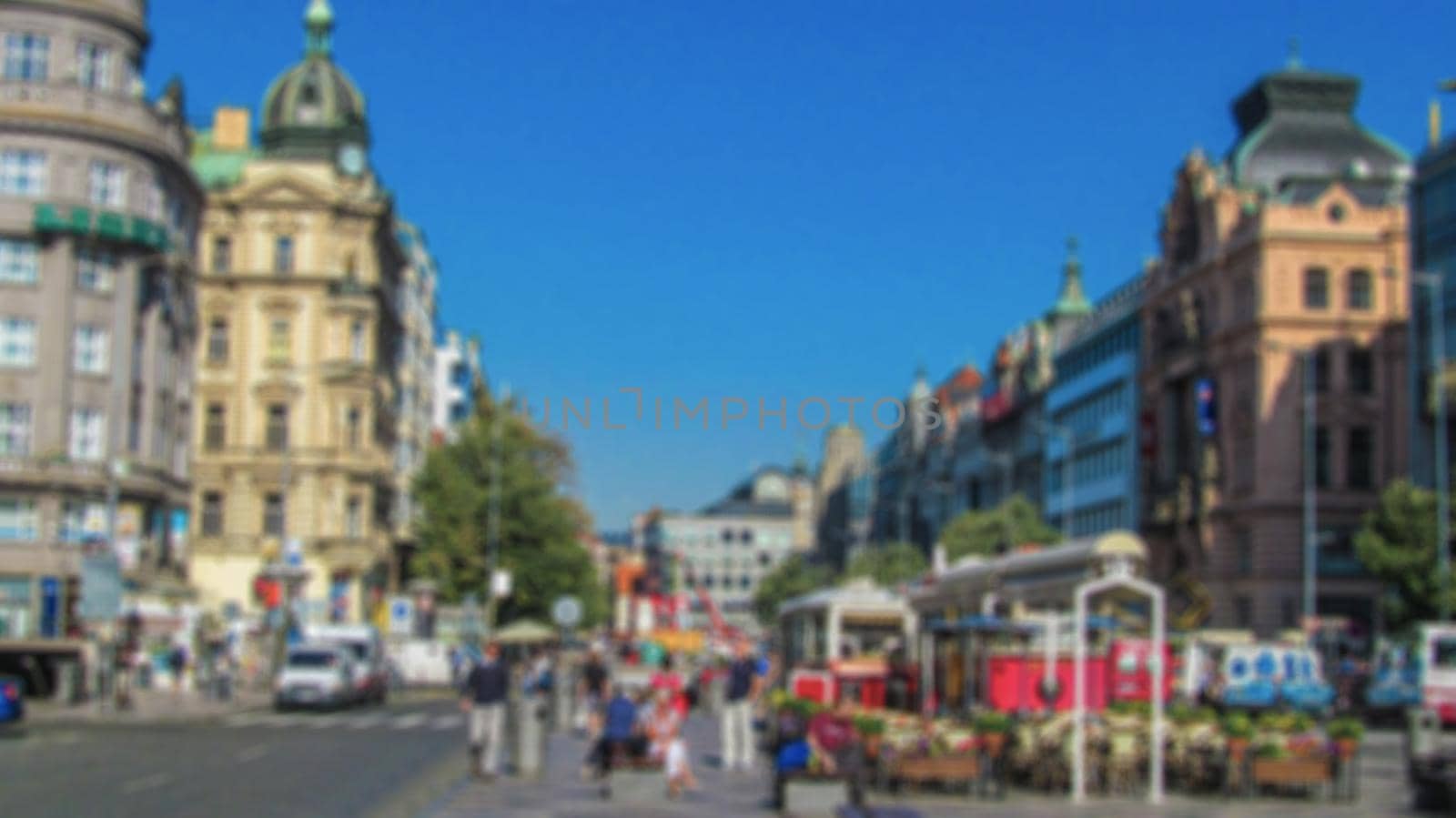 Urban landscape, city street. Creative background with blur and bokeh for a poster, banner or screensaver. by Grommik