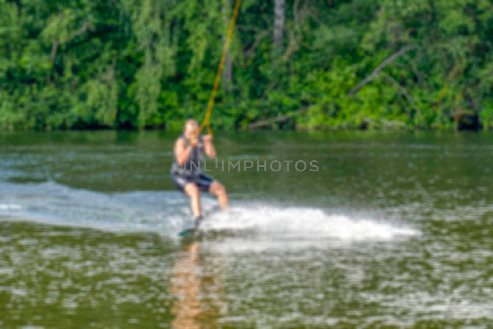 Creative story on the topic of kitesurfing with the blur and bokeh elements for thematic backdrops, posters and banners. by Grommik