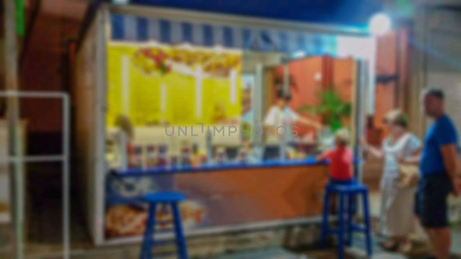 Blur with bokeh elements in the creative story on the topic of fast food. Stock photo for backgrounds.