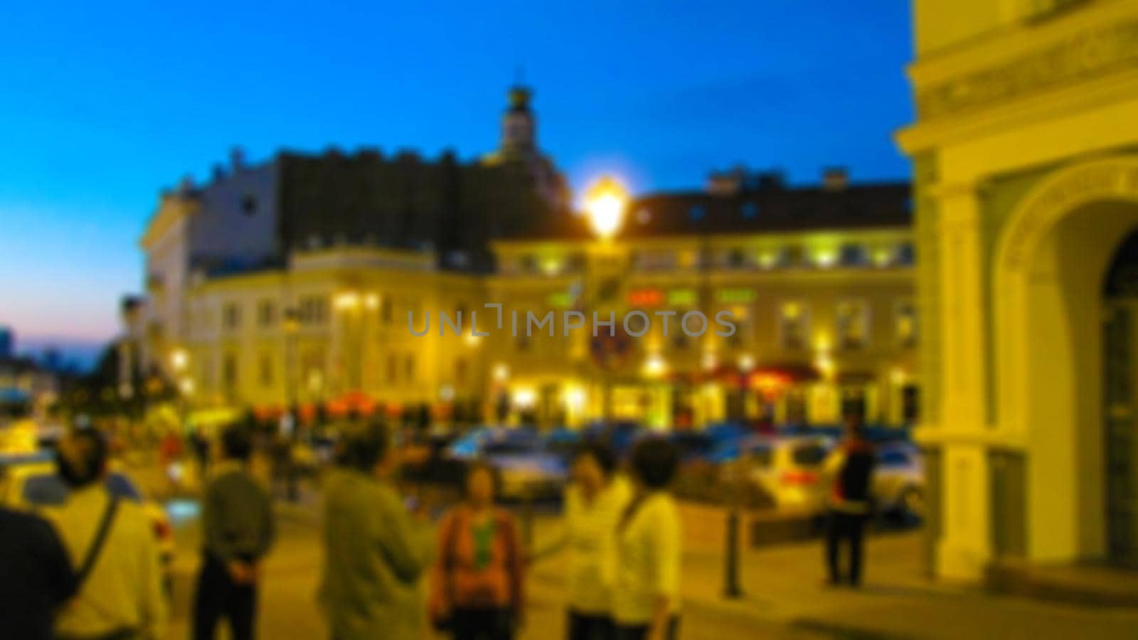 Urban evening landscape. Tourism and travel theme creative abstract blurred background with bokeh effect by Grommik
