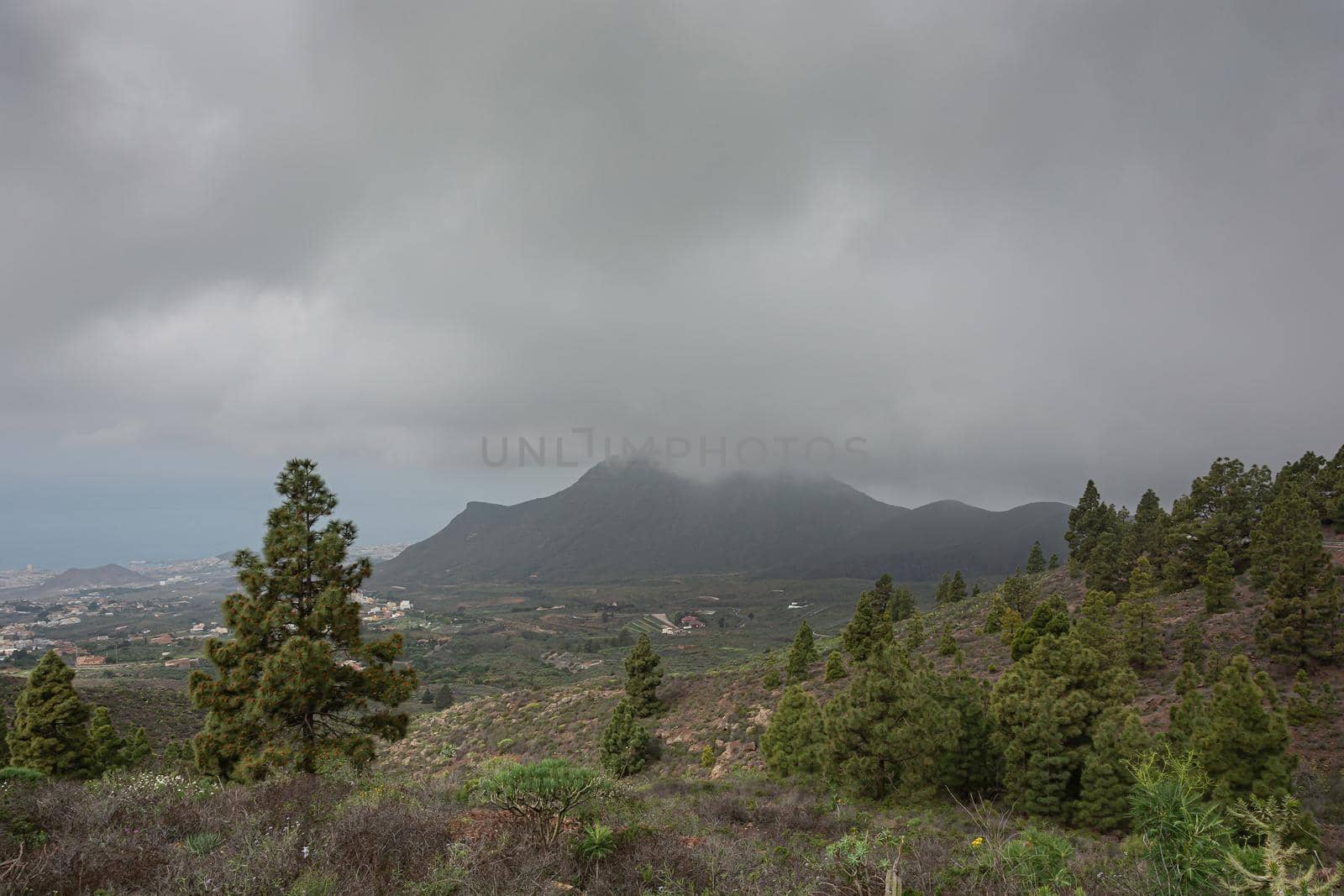 Mountain landscape. Low clouds covered the top of the mountain by Grommik