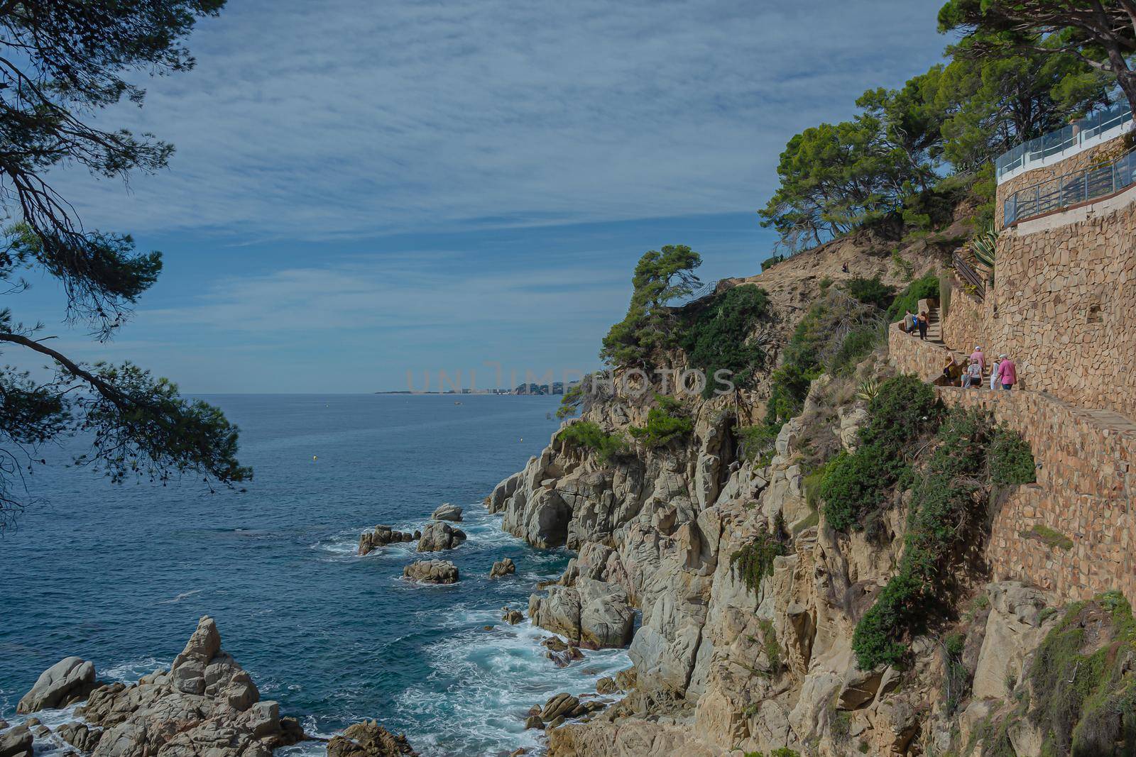 Seascape. Rocky seashore, Sunny day, good weather. Stock photo.