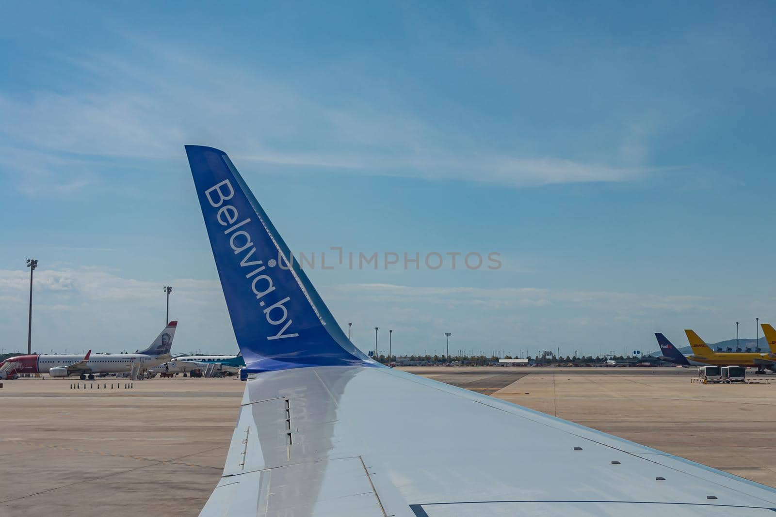 Berlin, Germany - 09/26/2017: the Wing of the aircraft of the airline Belavia by Grommik