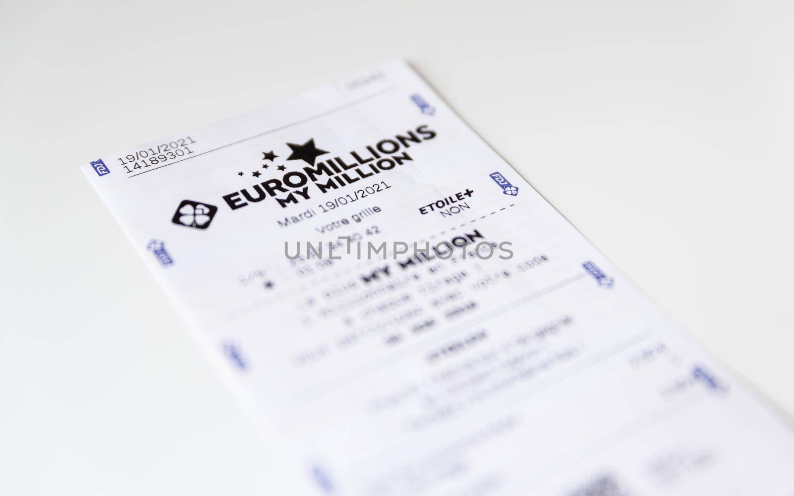 BAYONNE, FRANCE - CIRCA JANUARY 2021: Francaise des Jeux Euromillions receipt on white background. EuroMillions is a European transnational lottery, it was launched in 2004.
