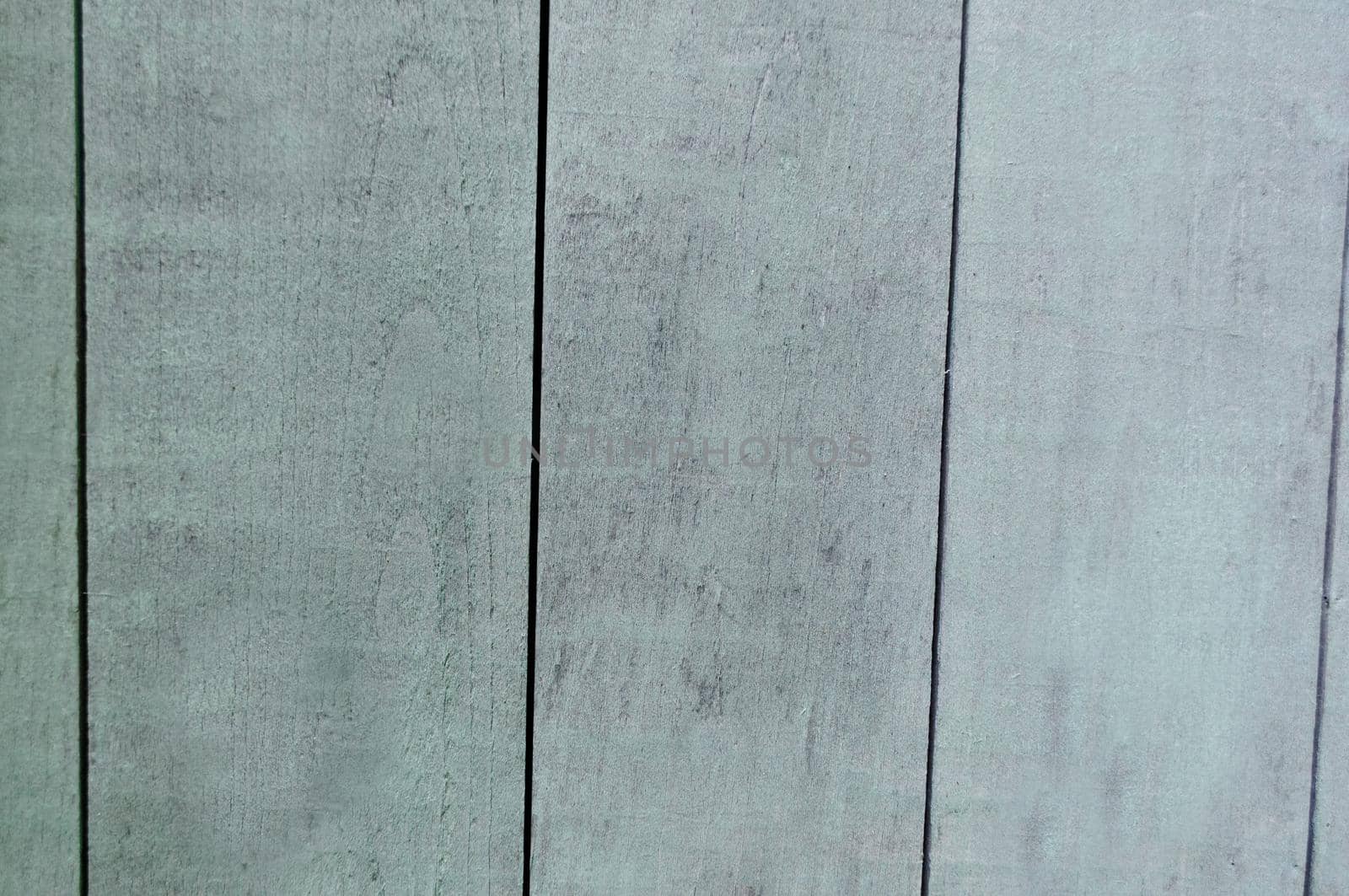 Old painted light green wood board background texture.Texture or background