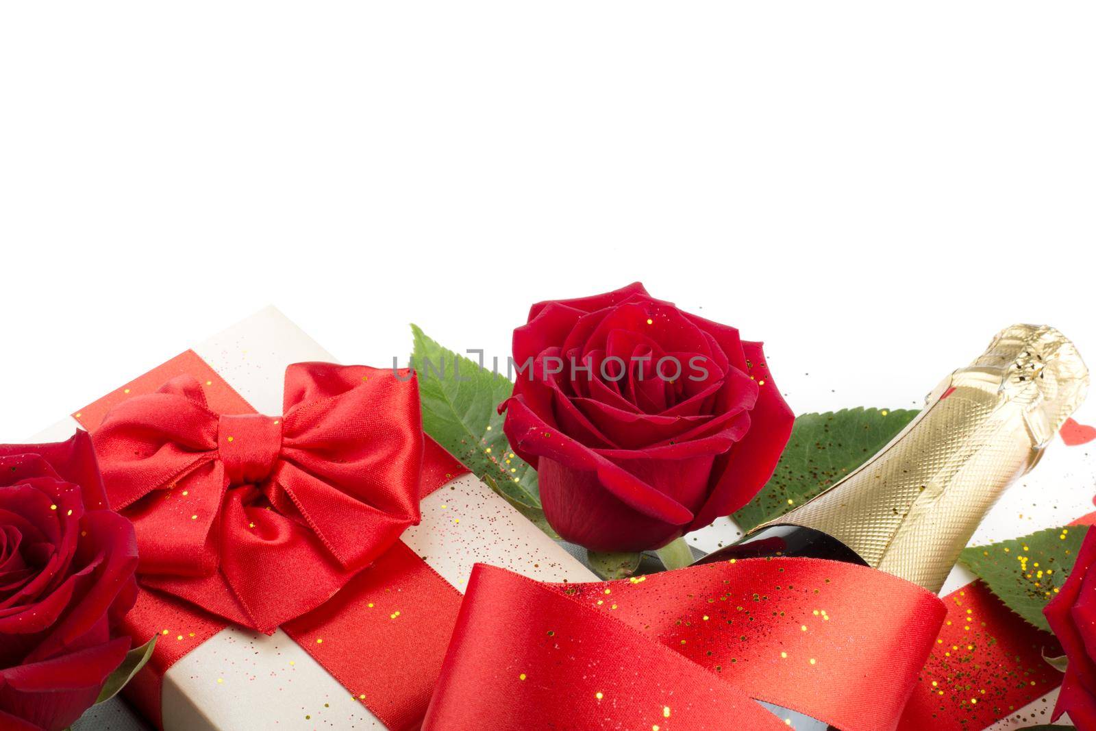 Valentines day composition flat lay top view with gift box rose flowers gift champagne and hearts design element isolated on white background with copy space for text