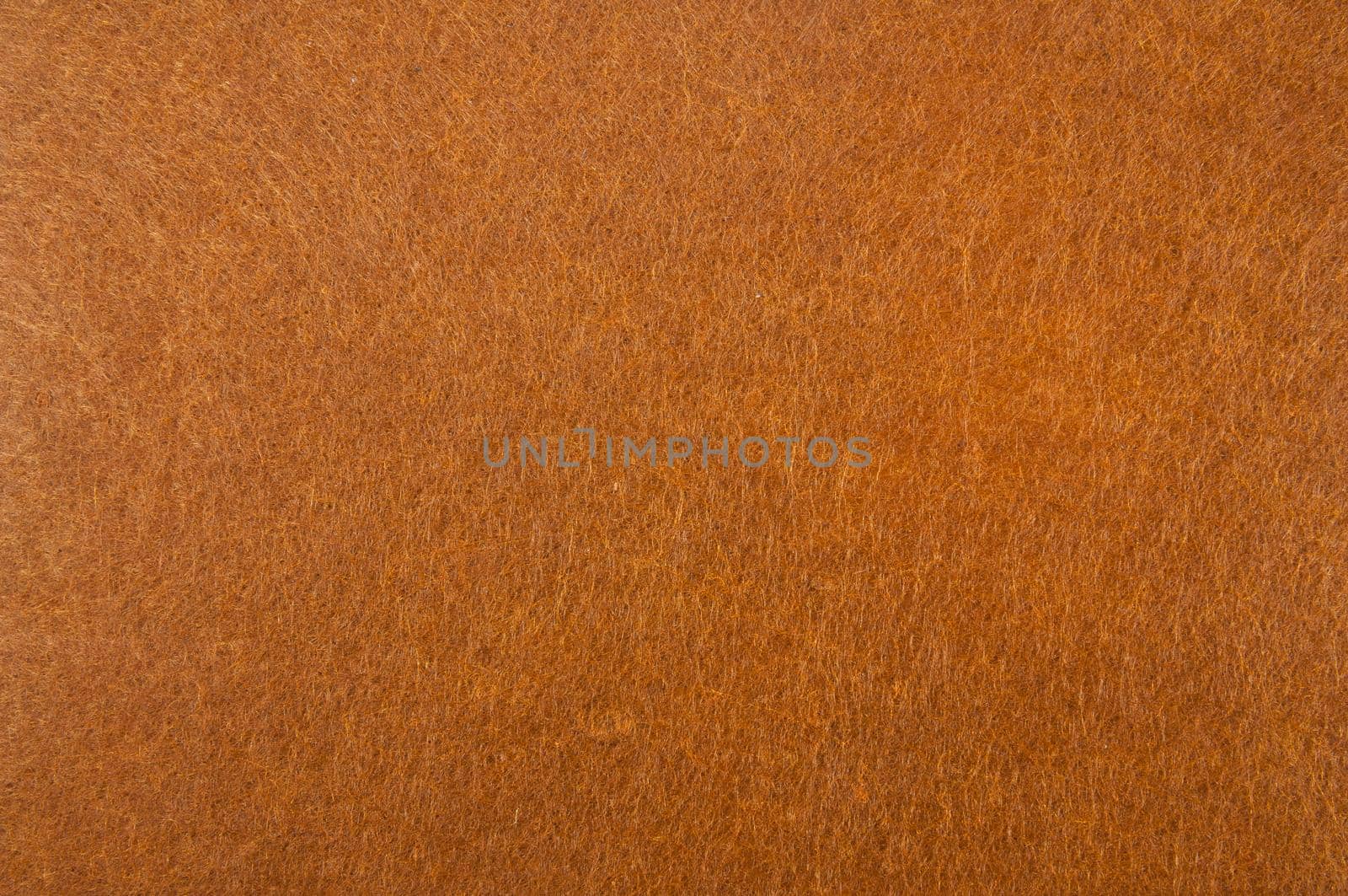Texture background of Light Brown velvet or Orange flannel Fabric as backdrop or wallpaper pattern for decoration