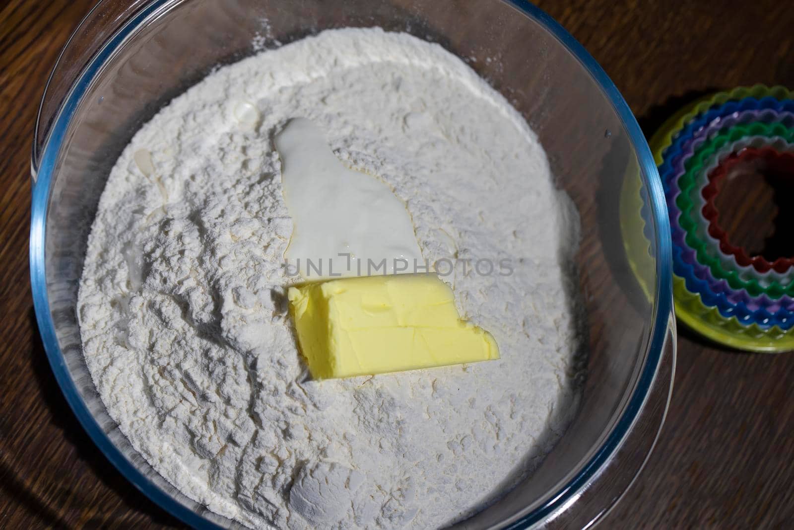 Baking. A piece of butter or margarine in flour.