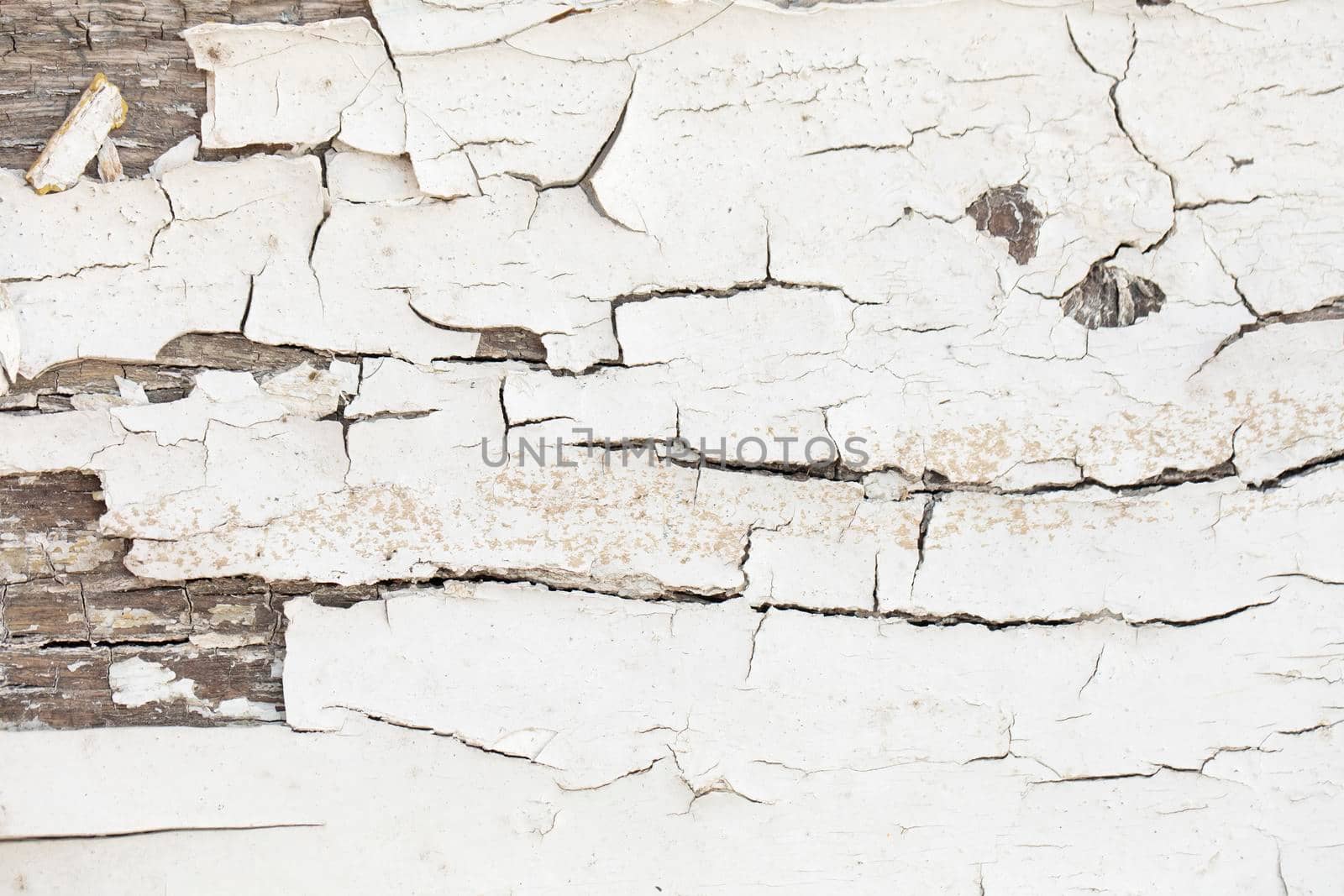 Wood texture with white peeled paint.Vintage shabby background white.