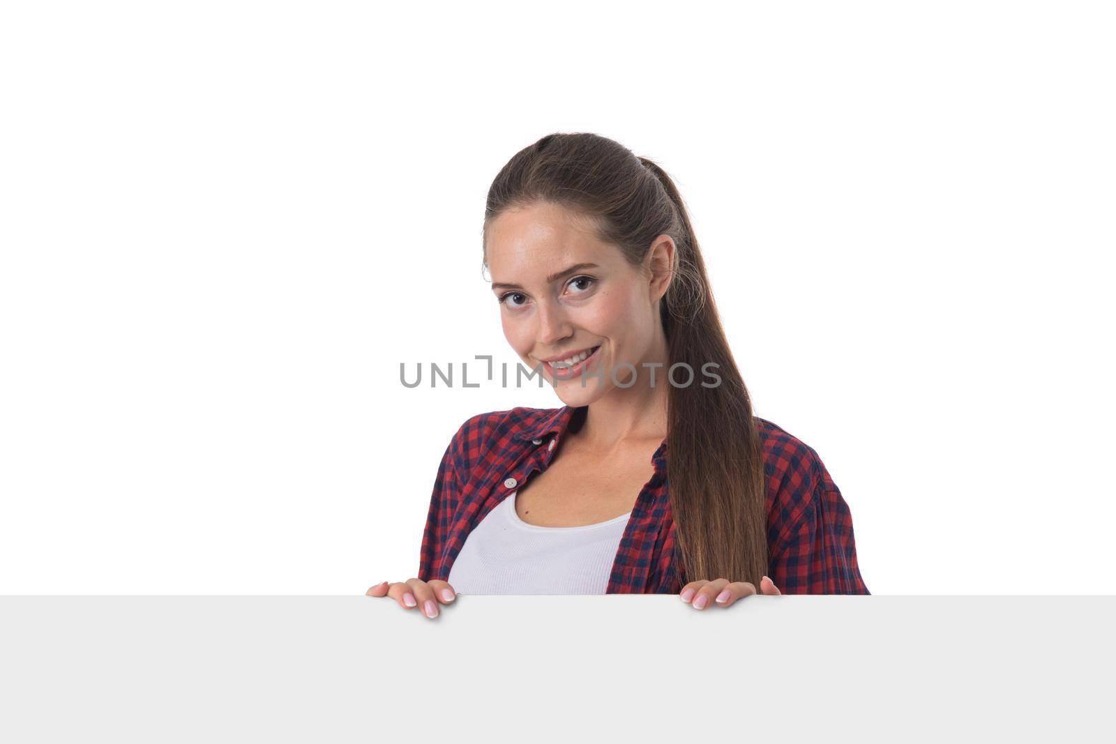 Portrait casual caucasian woman displaying a banner ad isolated over a white background