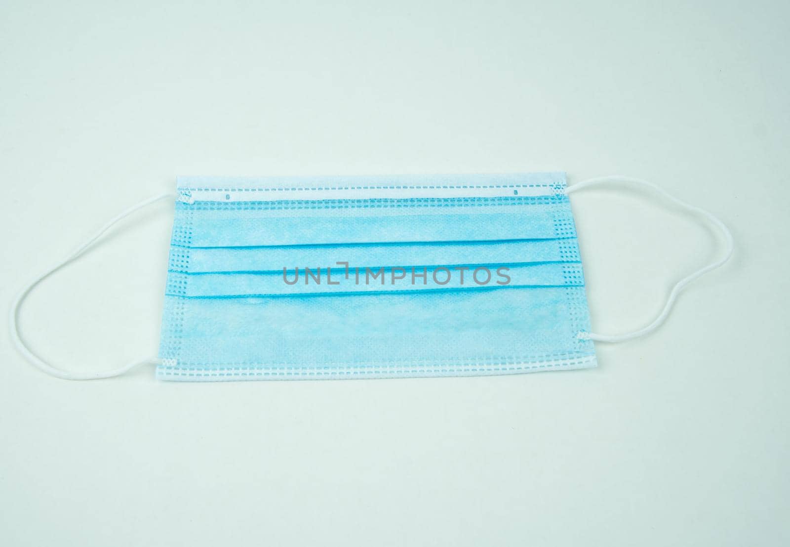 Surgical mask and cotton swab to fight against the coronavirus