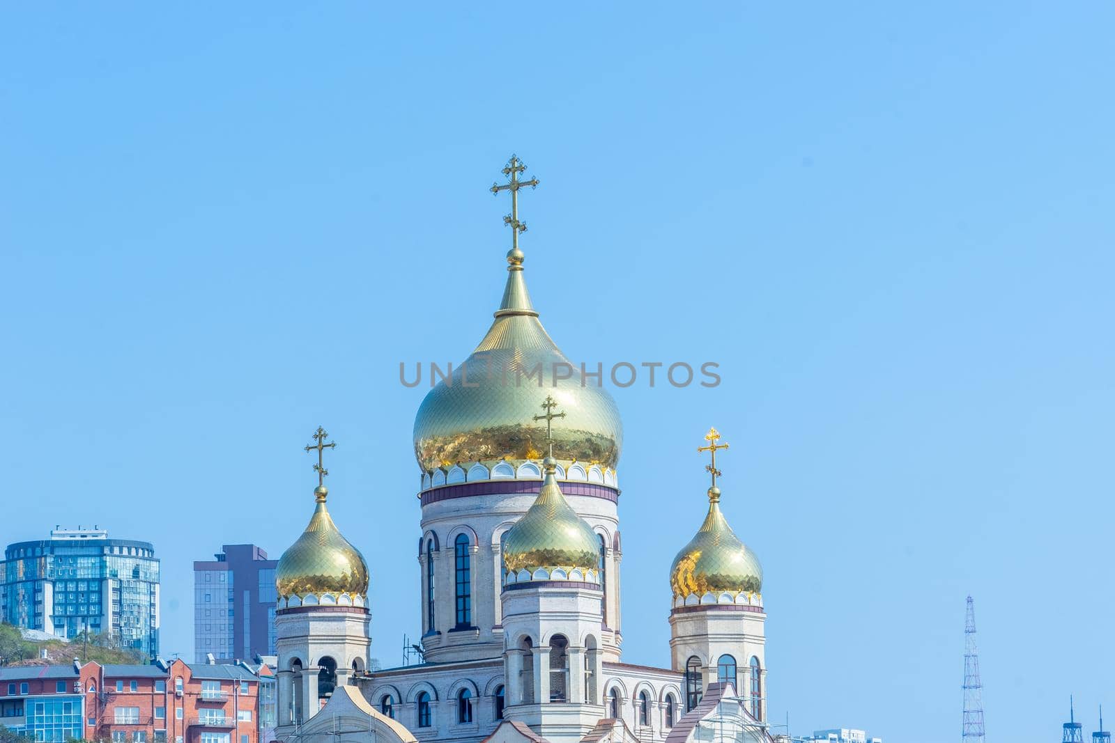 Vladivostok, Russia. Urban landscape with a view of the Golden domes of the temple