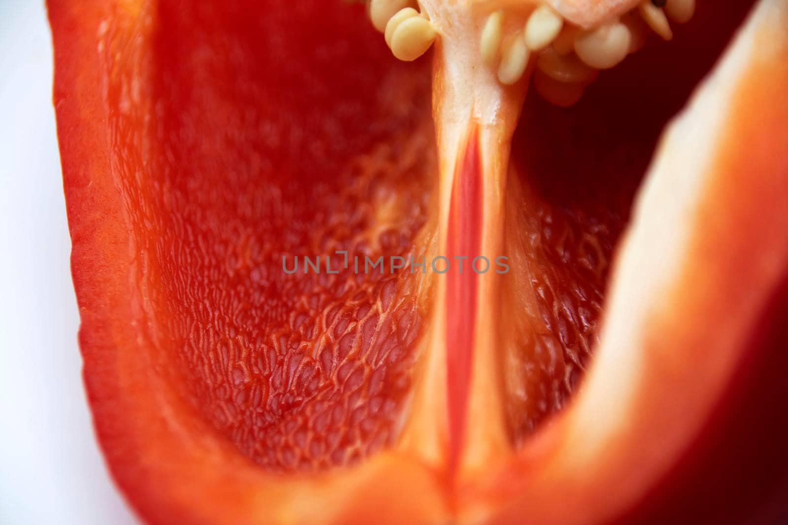 Ripe juicy bell peppers in a cut close-up.