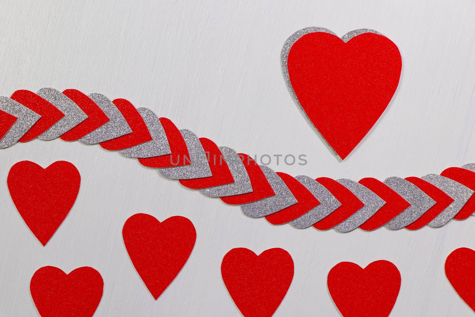 Red And Silver Heart Above Heart String With Red Hearts On White by jjvanginkel