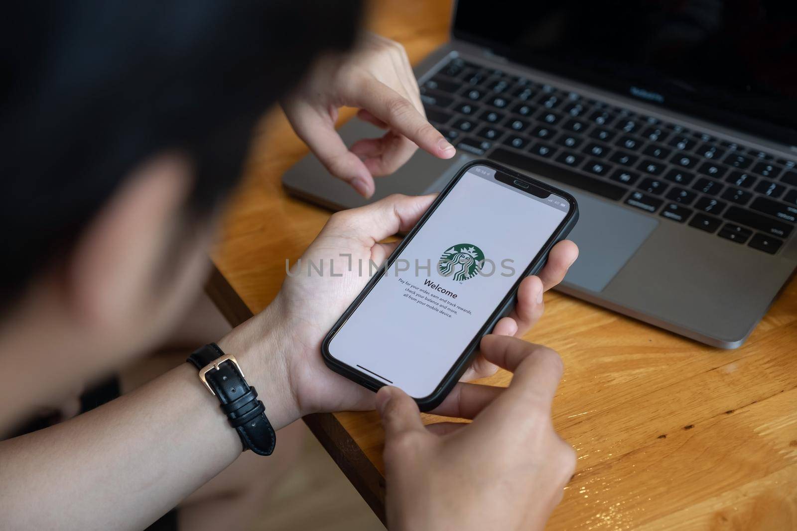 CHIANG MAI, THAILAND - JAN 23, 2021 : Starbucks app on the Apple iPhone display screen. opening online menu page of Starbucks website, Starbucks coffee shop by nateemee
