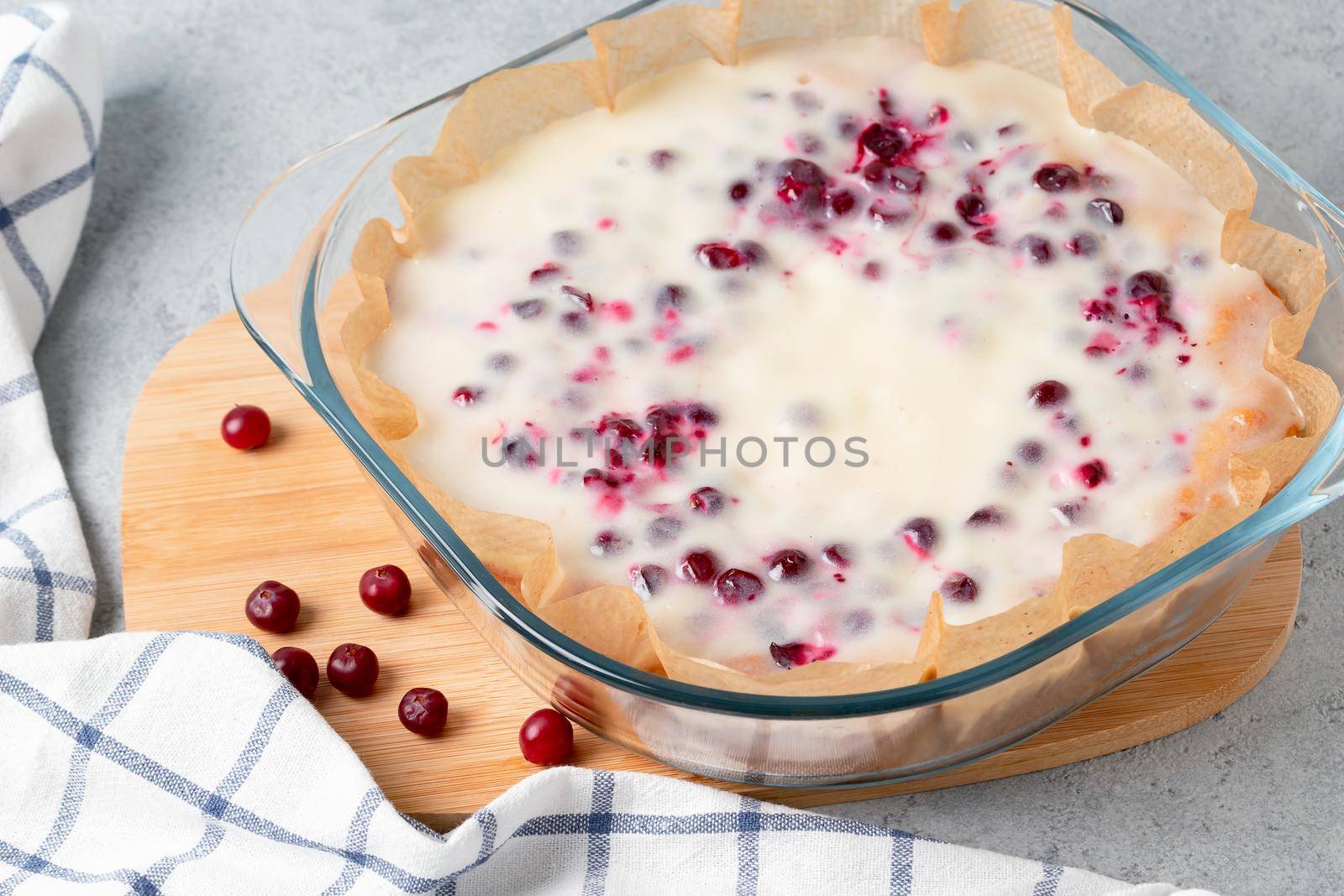 Homemade cranberry and sour cream pie in a glass baking dish by galsand